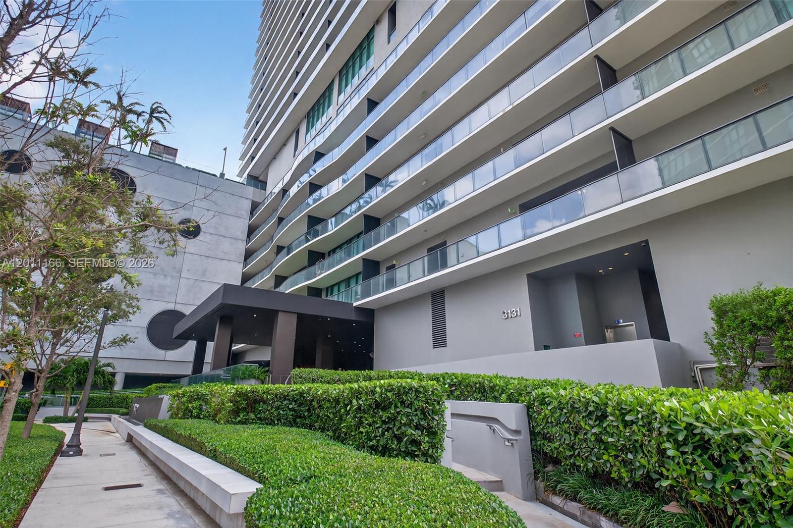 This stunning turnkey 3-bedroom, 3.5-bathroom condo with a den is located at One Paraiso Condominium. It offers gorgeous views of Biscayne Bay and Miami Beach, private elevator access, a foyer entrance, 9-foot ceilings, floor-to-ceiling windows, custom European cabinetry, Sub-Zero and Wolf appliances, Italian porcelain floors, a storage unit, custom closets, and blackout shades. One Paraiso offers resort-style amenities, two Olympic-size pools, a hot tub, fitness center, spinning and yoga rooms, a spa, steam room, sauna, party room, business center, children’s playroom, library, 2 tennis courts & more! Maintenance covers water, cable TV, internet, and an assigned parking spot. Conveniently located near restaurants, grocery stores, museums, the Design District, Midtown, Wynwood, and Downtown Miami.