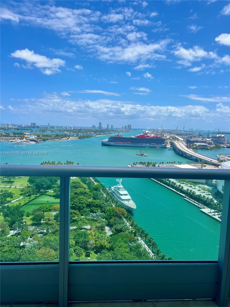 Luxury living meets the convenience and the best views of Miami. Discover the perfect blend of comfort, style, and unobstructed Biscayne Bay and ocean views in this beautifully maintained 1bedroom, den, 1.5 bathroom condo located in the heart of downtown Miami. Step inside to find an open-concept layout filled with natural light, featuring a modern kitchen with stainless steel appliances, quartz countertops, and custom cabinetry. The spacious living and dining areas flow seamlessly onto the balcony with floor-to-ceiling windows forever water views all the way to South Beach. Perfect for relaxing or entertaining. The primary bedroom suite offers a peaceful retreat with a walk-in closet and spa-inspired bathroom, while the den provide flexibility for guests, a home office, or family living. Resort-style amenities (pool, fitness center, clubhouse, concierge), In-unit laundry, Assigned parking garage, Pet-friendly community.