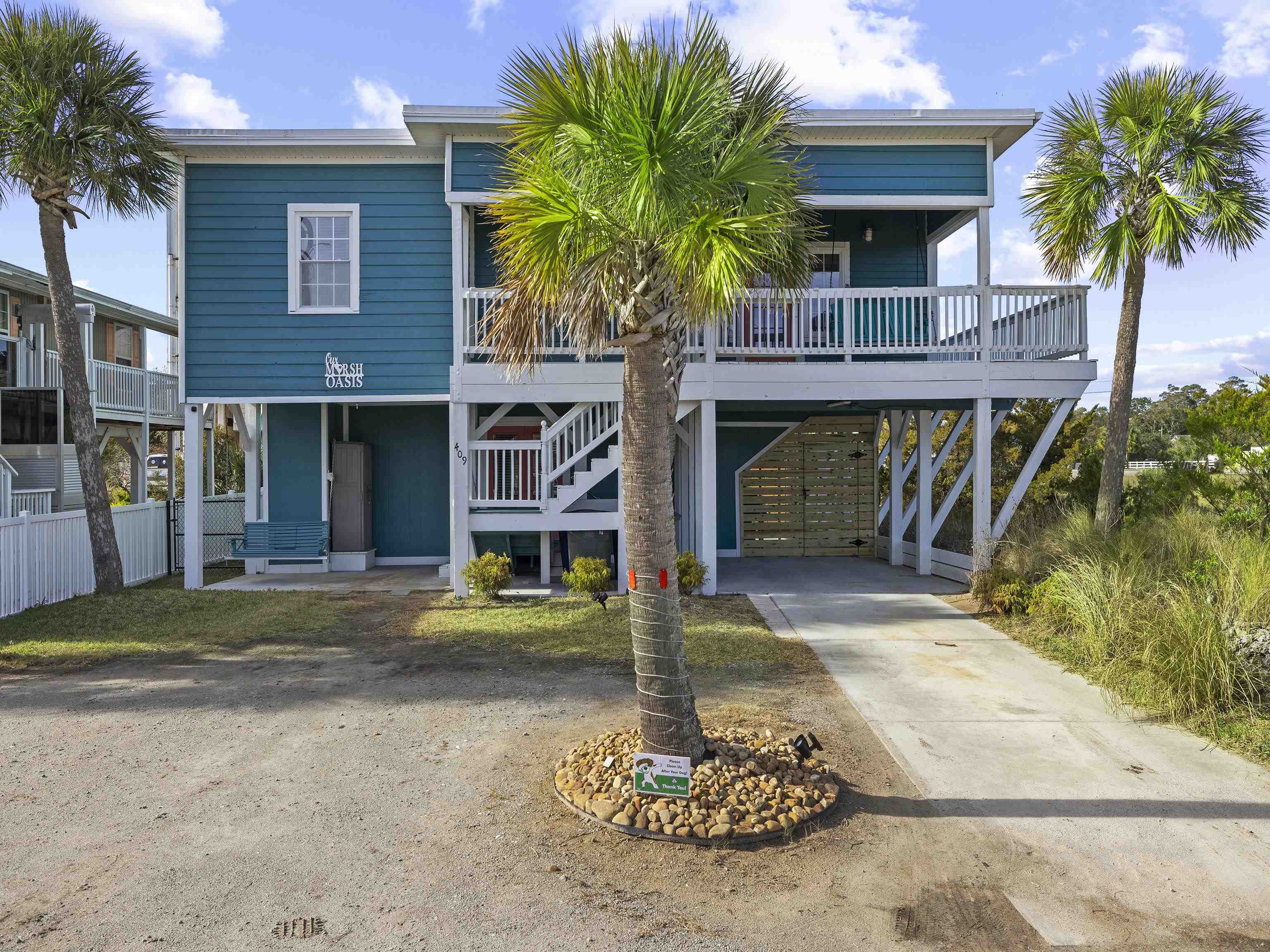 Welcome to your dream coastal retreat in the heart of Cherry Grove Beach, just a short stroll from the sand and the vibrant energy of this coastal area. This stunning 4-bedroom, 2-bathroom raised beach home has been thoughtfully remodeled to blend modern comfort with timeless coastal charm. Highlights Include: Bonus Flex Room currently set up as a bedroom ideal for guests or short-term rental income. The Luxury vinyl plank flooring throughout offers a sleek look with low maintenance. A Spacious kitchen has ample cabinetry, generous counter space, and modern finishes. Gorgeous new tile walk-in showers in both bathrooms create a spa-like experience. An Open floor plan enhances natural light and coastal breezes. Outdoor Living offers a Wraparound deck with unobstructed views—this is the last home on the street giving you privacy! The Spacious backyard offers room for a small pool. Enjoy the expansive covered patio downstairs featuring a hot tub and outdoor shower perfect for entertaining or unwinding after a beach day Great Investment Potential: With short-term rentals allowed, this home offers excellent income opportunities in one of North Myrtle Beach’s most loved beach areas. Just minutes from local favorites like Snooky’s Oceanfront, Boulineau’s Foods Plus, and Murphys. This gem won’t last long.  Schedule your showing today and make this beachside beauty yours!  Every effort is made to provide accurate information; however, it is the buyers responsibility for verification