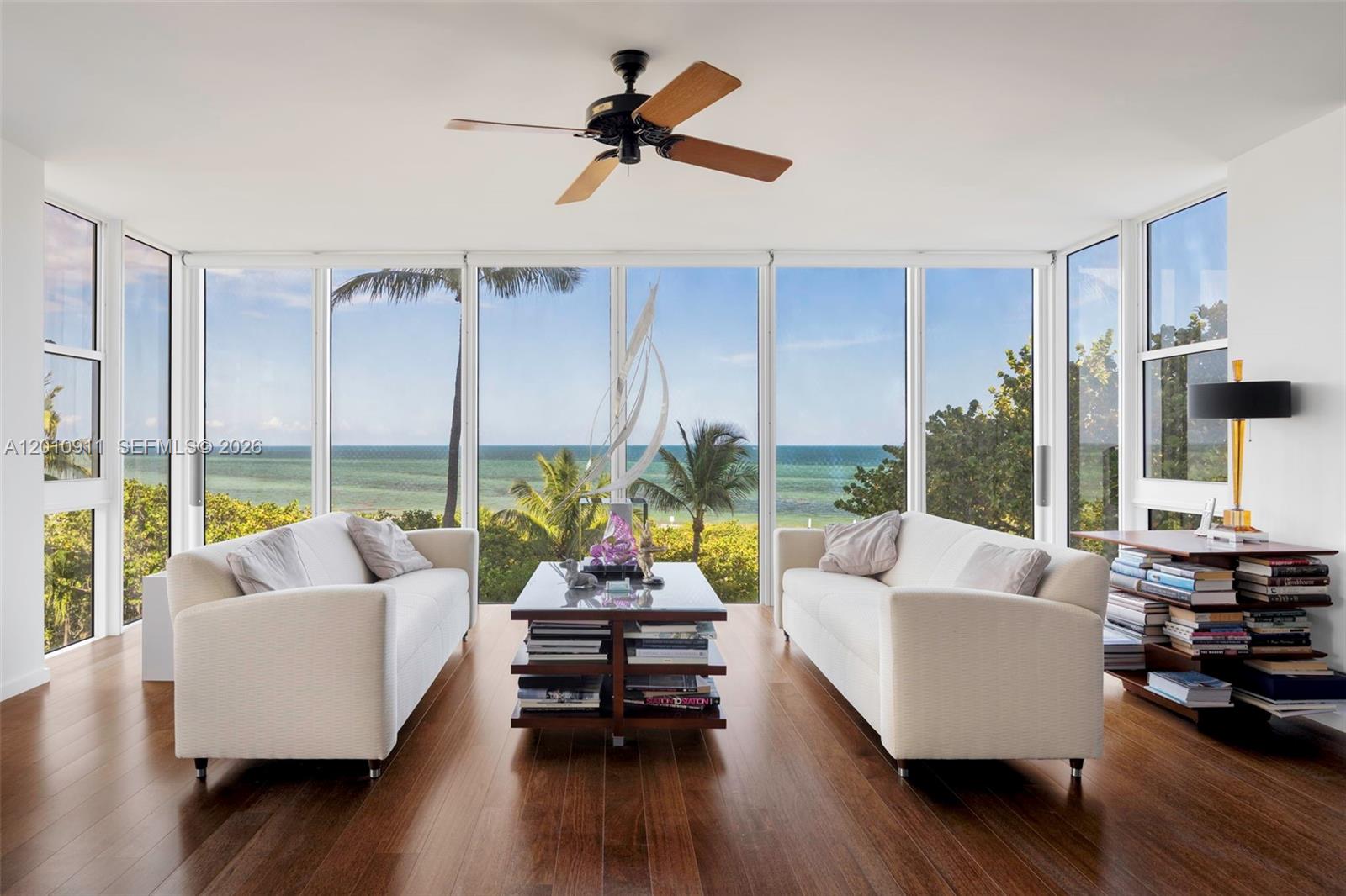 A premier oceanfront residence in Key Biscayne offering sweeping panoramic views and direct beach access just steps away. Positioned on the coveted 01 line, this expansive 3-bedroom plus den, 3-bath home features sunlit interiors and floor-to-ceiling windows that frame the ocean from nearly every room, creating a seamless connection to the horizon. Generous living and dining areas are designed for both relaxed daily living and effortless entertaining, while refined finishes and thoughtful details enhance the overall sense of comfort and sophistication. The well-proportioned layout includes a versatile den ideal for a home office or additional lounge space. Complete with impact glass, an open balcony, and access to full-service building amenities, this residence captures the essence of elevated coastal living in one of Key Biscayne’s most desirable beachfront communities.