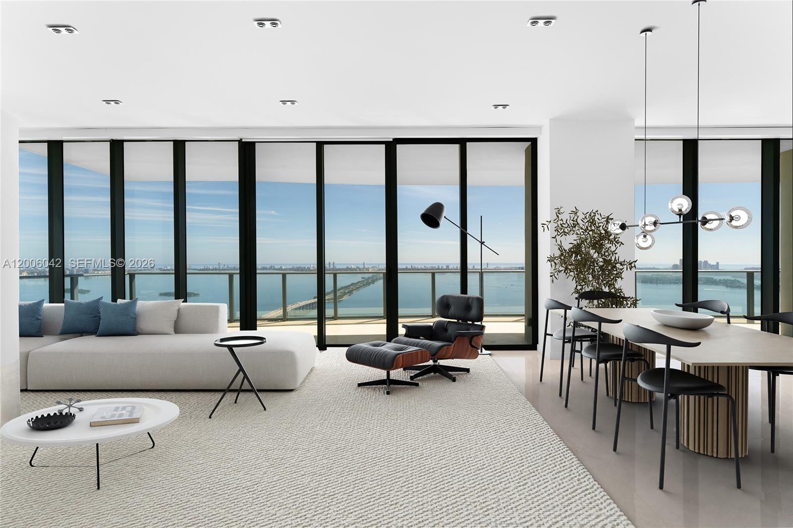 Experience luxury living in this stunning corner penthouse at One Paraiso, in Edgewater. This spacious 5BR,/5.5BA unit, offers 2,887SF of refined living space & private elevator entry. Gres Porcellanato floors throughout, dual terraces w/breathtaking sunrise & sunset views in all directions—North, South, East & West. Open living room extends from the dining area, featuring floor-to-ceiling windows/doors that open to an expansive terrace with direct bay & ocean views. A Chef’s kitchen boasts a marble island, custom cabinetry & top-tier appliances. Primary suite offers direct terrace access, dual walk-in closets, & spa-style bathroom - oversized rain shower & sunken tub.3 additional BR’s includes a staff BR all with ensuite baths. Amazing location & lux amenities complete this offering.