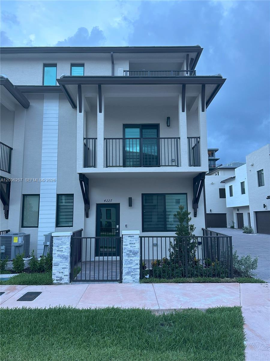Modern multi-level townhome in Urbana at Downtown Doral, offering a refined balance of space, design, and lifestyle. This residence features a well-designed floor plan with generous living areas, abundant natural light, and contemporary finishes throughout. A private terrace provides the perfect setting for outdoor lounging or entertaining. Residents enjoy access to resort-style amenities including a clubhouse, fitness center, and pool, all within a professionally maintained community. Ideally positioned within walking distance to Downtown Doral’s restaurants, shops, and parks, delivering a highly convenient and walkable lifestyle in one of Doral’s most desirable neighborhoods.