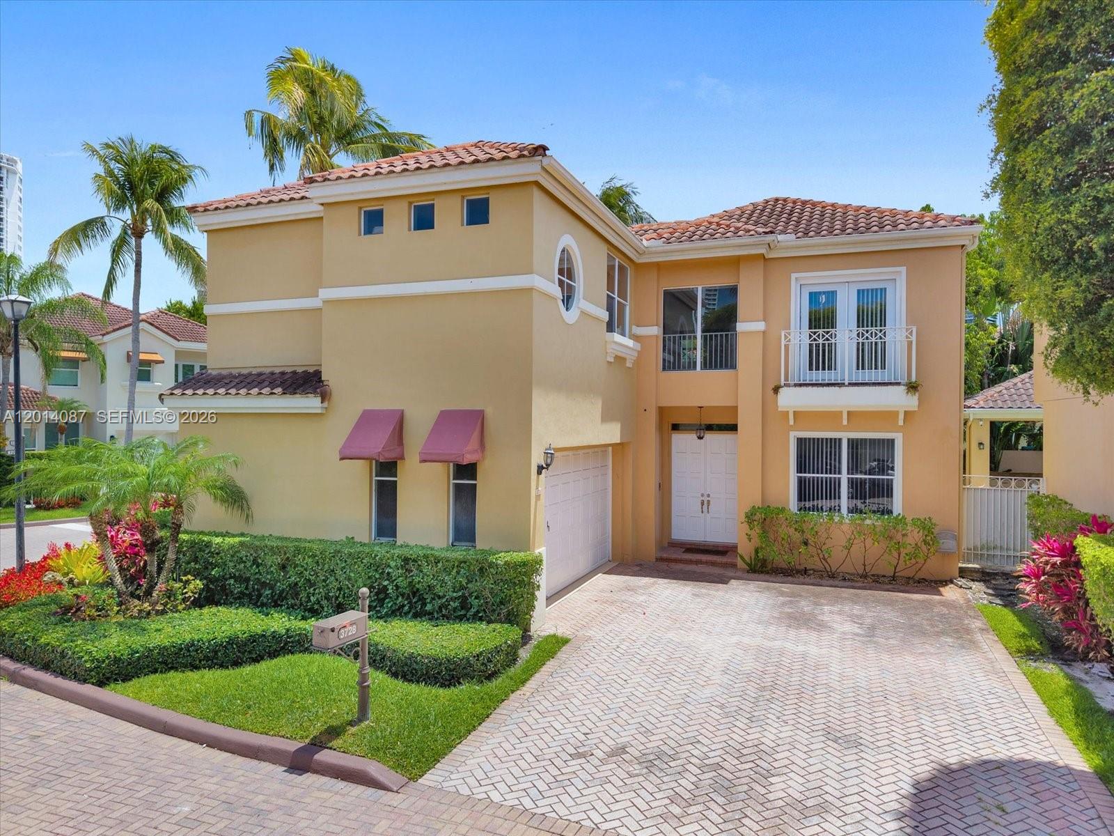Located in the exclusive gated community of Island Way in the heart of Aventura, this elegant 3-bedroom, 3.5-bath residence offers spacious interiors, soaring ceilings, and abundant natural light throughout. The thoughtfully designed layout features expansive living and dining areas, ideal for both entertaining and everyday living. The kitchen seamlessly connects to a generous breakfast and family room, creating a warm and functional atmosphere.Step outside to a private backyard retreat with a pool, patio, and BBQ area, perfect for enjoying the South Florida lifestyle year-round. The spacious primary suite includes walk-in closets, a spa-inspired bathroom with jacuzzi tub, dual vanities, and separate shower, plus an additional space ideal for a home office or sitting area. Additional features include a dedicated laundry room and a two-car garage. Prime Aventura location just minutes from Aventura Mall, top-rated schools, parks, restaurants, marinas, and the beach.