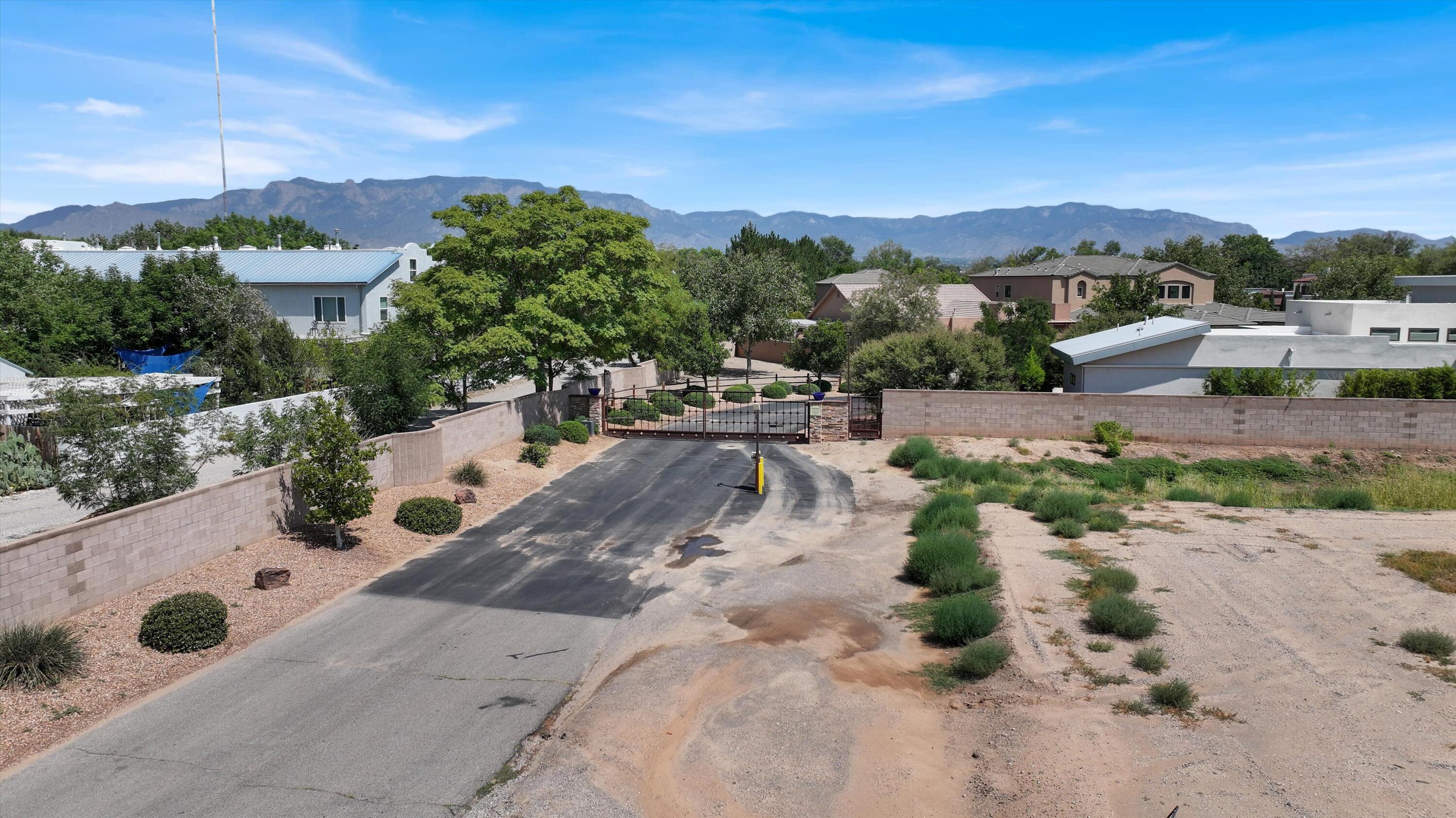 Homes for sale in Los Ranchos, NM | 309 Nuevo Hacienda Ln Nw, Los Ranchos, NM 87107 | MLS# 1103778