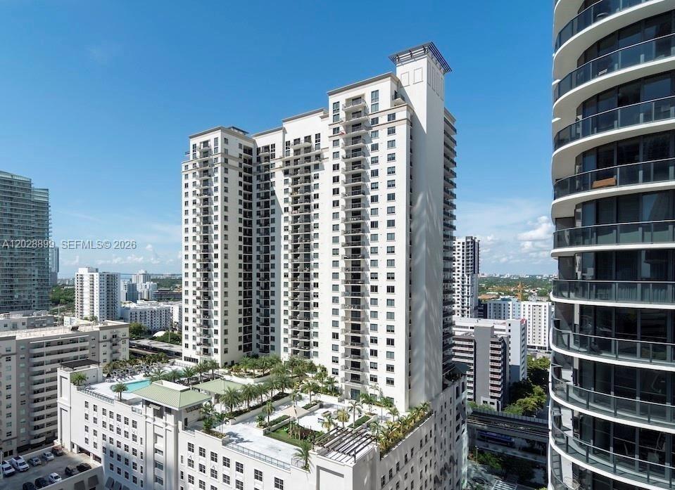 Spectacular 2-bedroom + den, 2-bath residence in Brickell Heights East with stunning east-facing city and bay views. This beautifully appointed unit features sleek porcelain floors, floor-to-ceiling windows, a spacious balcony, custom-made closets throughout, automated blinds in the bedrooms, and an additional custom closet in the primary bathroom. A private storage unit located on the 8th-floor  at the storage area is also included. Building Designed by Arquitectonica with interiors by David Rockwell, Brickell Heights offers world-class amenities including two pools, a jacuzzi, media room, business center, 24-hour security, valet, and concierge services. Ideally located in the heart of Brickell, just steps from Brickell City Centre, Mary Brickell Village, premier dining, shopping, and entertainment. A perfect blend of luxury, convenience, and lifestyle.