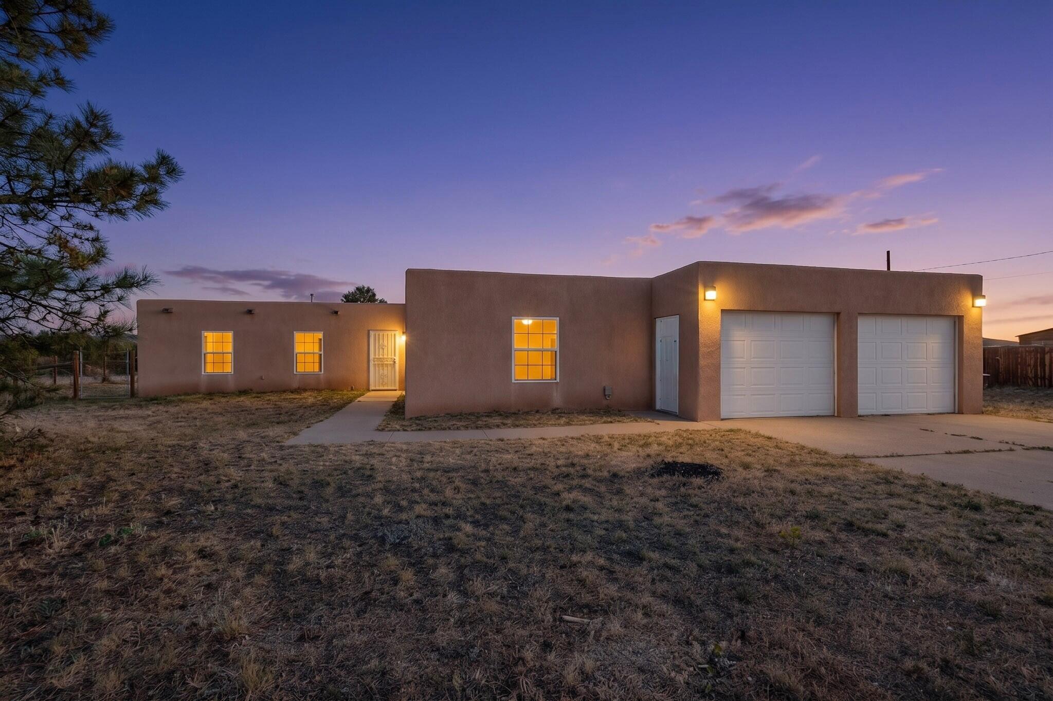 This one of a kind property is an absolute must see. Almost ten completely fenced and cross fenced acres in a highly sought after area with a 200 sq ft barn that will thrill the most serious livestock people. There is also a multiple space kennel building on the property with heat. Fenced and cross fenced property designed for easy access and turn out. Beautiful, old style, pueblo home with vigas. There is also a lovely, detached office that makes this an incredibly useful property.