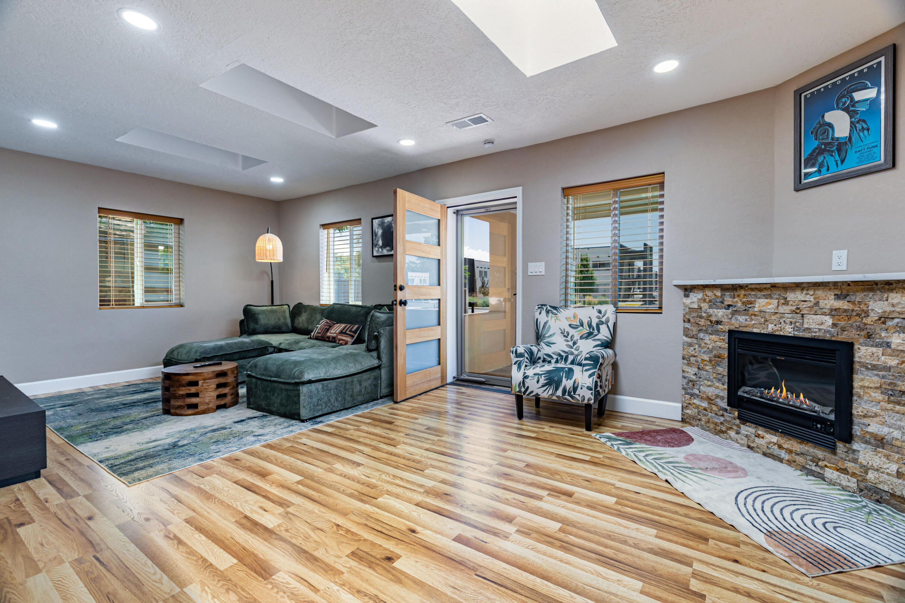 Thoughtfully renovated and full of character, this 1936 adobe home sits on a spacious lot in Albuquerque's historic North Valley. Blending timeless architectural charm with modern updates, the home offers the best of both worlds. The expansive kitchen features an impressive 10' x 6' center island, quartz countertops, custom-built hardwood cabinetry, under-cabinet lighting, abundant storage, and modern appliances. Major improvements include a new roof, thermal-pane windows, new stucco, and refrigerated A/C. Both bathrooms have been completely renovated with new plumbing, fixtures, tile, and lighting. An oversized utility room provides additional storage and functionality. The property also includes a private detached studio or flex space, rear access, and plenty of room for