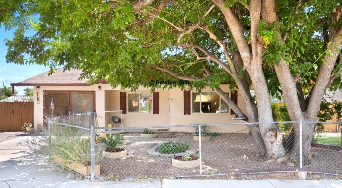 Charming 3 bed 2 bath home in the heart of Belen for sale! This tranquil home comes with updates and upgrades such as a newer gas furnace, newer water heater, new asphalt shingle roof installed in 2018, and new flooring and paint throughout the home. Enjoy the comfort of the landscaped front yard with rose bushes, low maintenance grass lawn, and a large fruitless Mulberry Tree adds plenty of shade and coverage. The large Sunroom at the back of the home is approximately 192 sq. ft, ideal as a sitting room, workshop, etc! The expansive backyard has a firepit and a garden area, perfect for entertaining guests! With an alleyway located just beyond the backyard, backyard access is available for parking vehicles, boats, RVs, campers, and more! Make this home yours today!