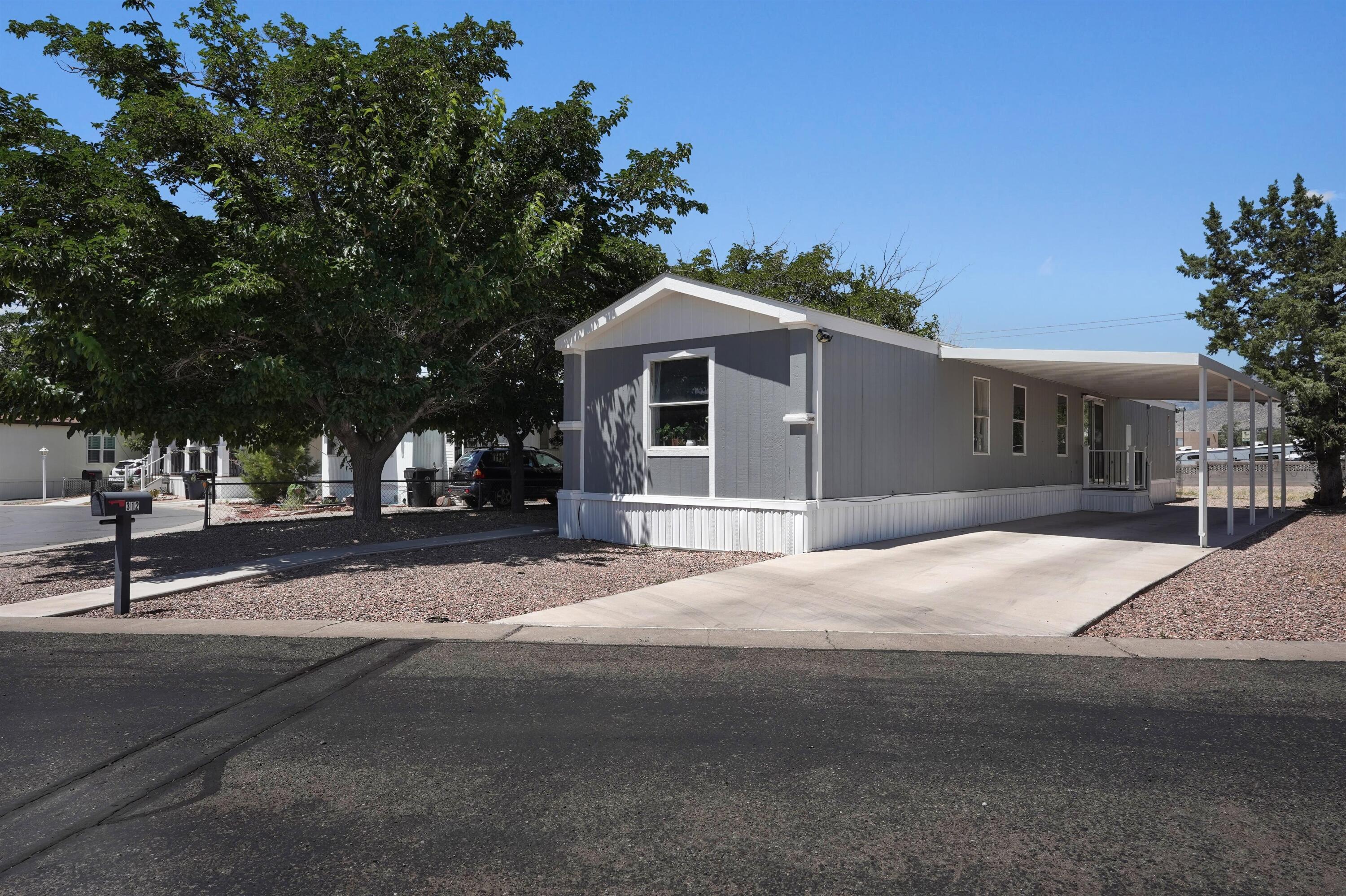 Beautifully remodeled manufactured home in the sought after Four Hills Mobile Home Park offering comfort, space, and value. The open living area provides a welcoming place to gather, while the functional kitchen, spacious primary suite, and two additional bedrooms offer a layout designed for everyday living. Outside, enjoy a generously sized lot with plenty of room for pets, entertaining, or simply relaxing. Residents also have access to outstanding community amenities including multiple activity centers, 24-hour security, tennis and basketball courts, three swimming pools, and more. Conveniently located, this move-in-ready home is an excellent opportunity to enjoy comfortable living in Four Hills. (Monthly land lease does apply)
