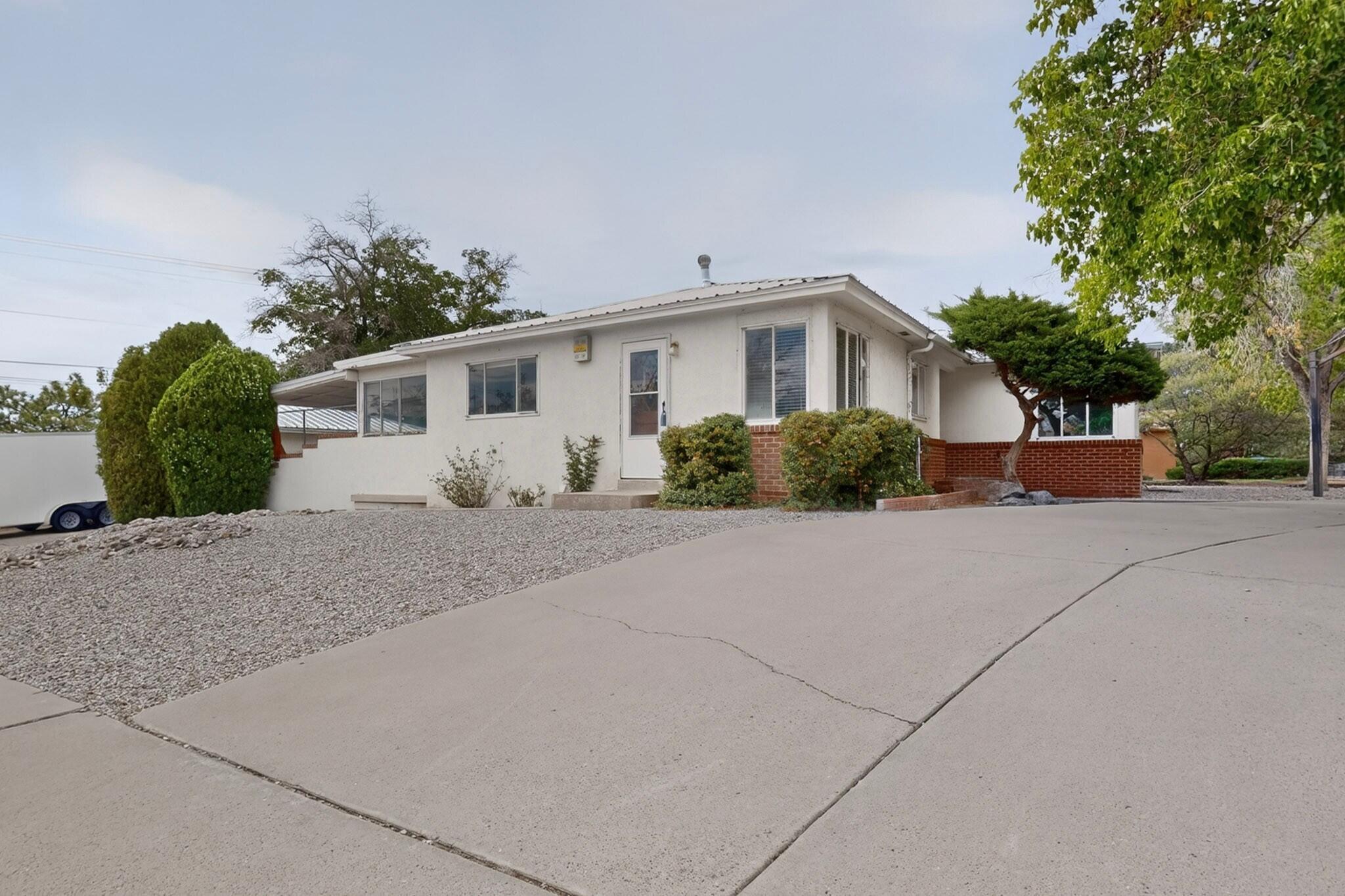 Photo 3 of Single family home for sale at 1401 Dartmouth Dr Ne, Albuquerque, NM 87106 | MLS# 1107905 | Listing updated on 2026-10-10