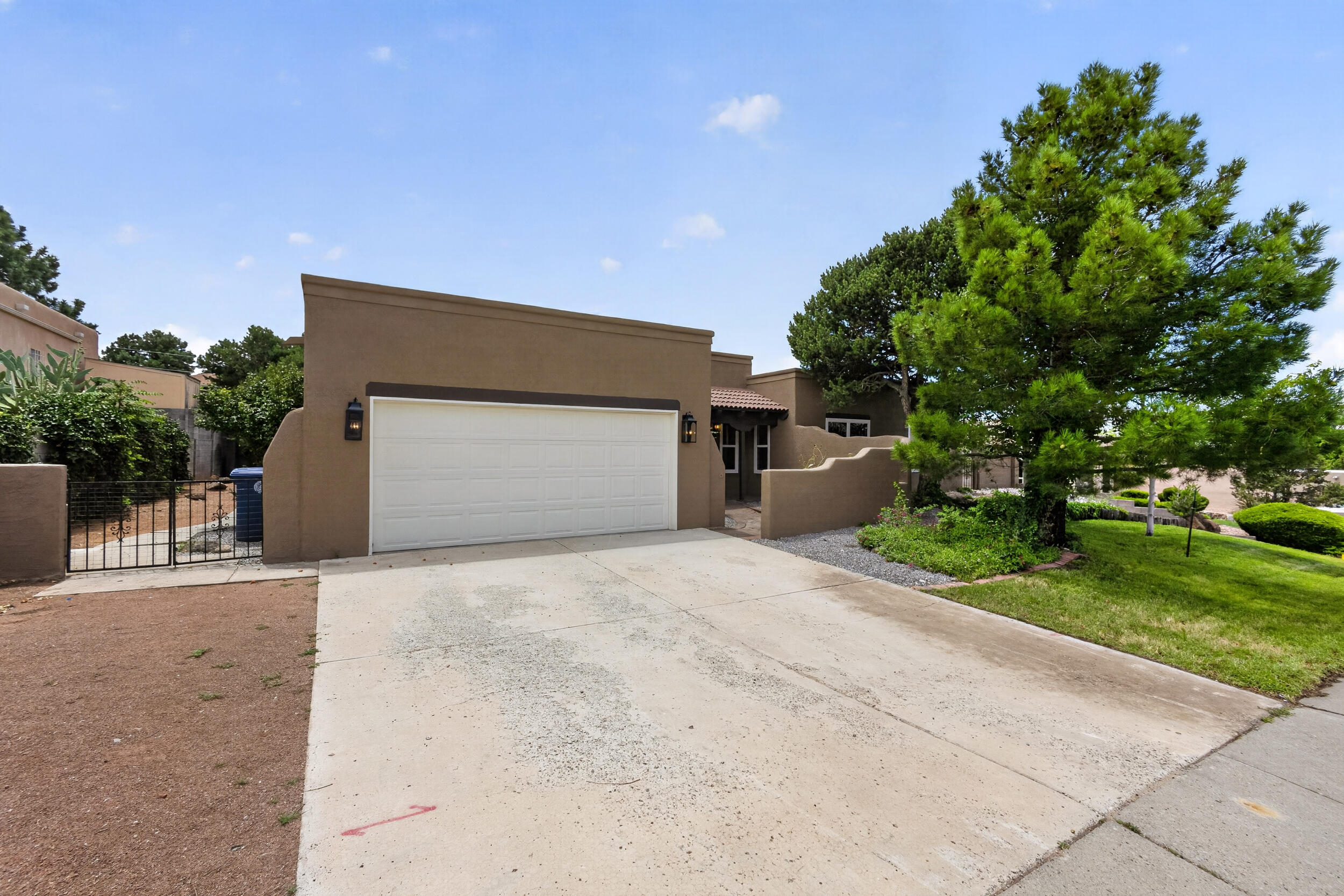 Photo 3 of Single family home for sale at 13012 Calle De Sandias Ne, Albuquerque, NM 87111 | MLS# 1107956 | Listing updated on 2026-10-21