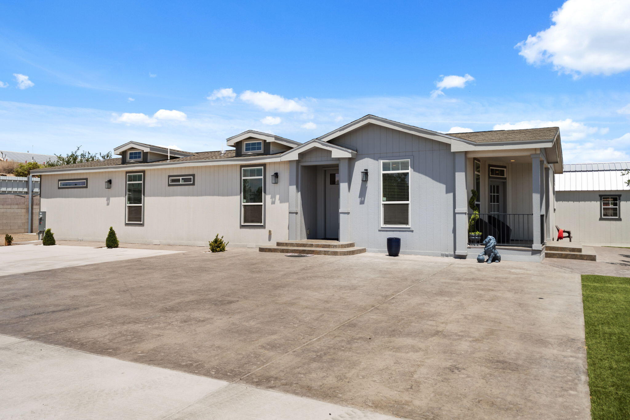 - Owner Financing Available! - Don't miss this beautifully upgraded Clayton manufactured home, thoughtfully designed with quality construction and modern finishes throughout. This home offers soaring 9-foot ceilings and an impressive 8-foot front door - Owner Financing - Clayton Manufacture home 2''x6'' Framing structure, 9'' inside ceiling high, main entrance door 8ft high, tile all house and bathrooms, Swim jacuzzi! Private high fence and block walk, irrigation, fully landscaped, design concrete front and back yard front entry door that creates a bright, open feel from the moment you step inside.Enjoy stylish tile flooring throughout the entire home, including all bathrooms, providing both elegance and easy maintenance. Step outside to your own private oasis featuring a swim hot tub, perfect for relaxing or entertaining year-round.This move-in-ready home combines comfort, quality, and exceptional outdoor living--with the added benefit of owner financing available. Excellent Location close to major shopping centers, Walmart and movie theater.