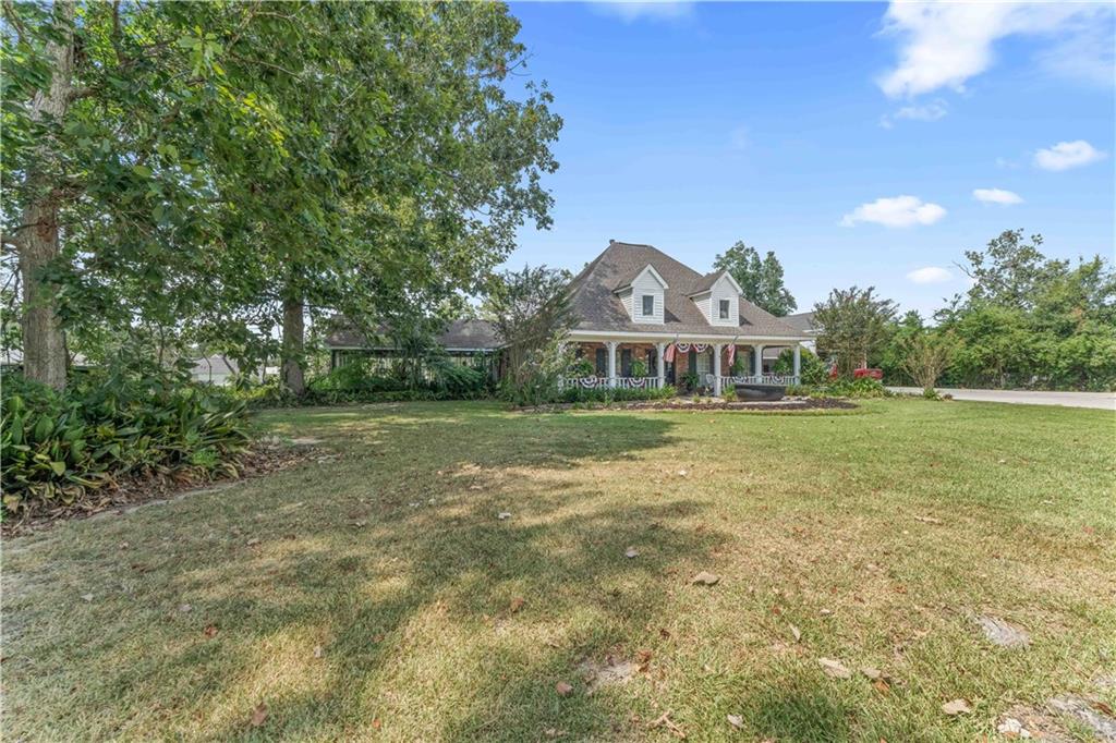 Photo 2 of Single family home for sale at 32295 Keila Dr, Springfield, LA 70462 | MLS# 2569842 | Listing updated on 2026-09-08