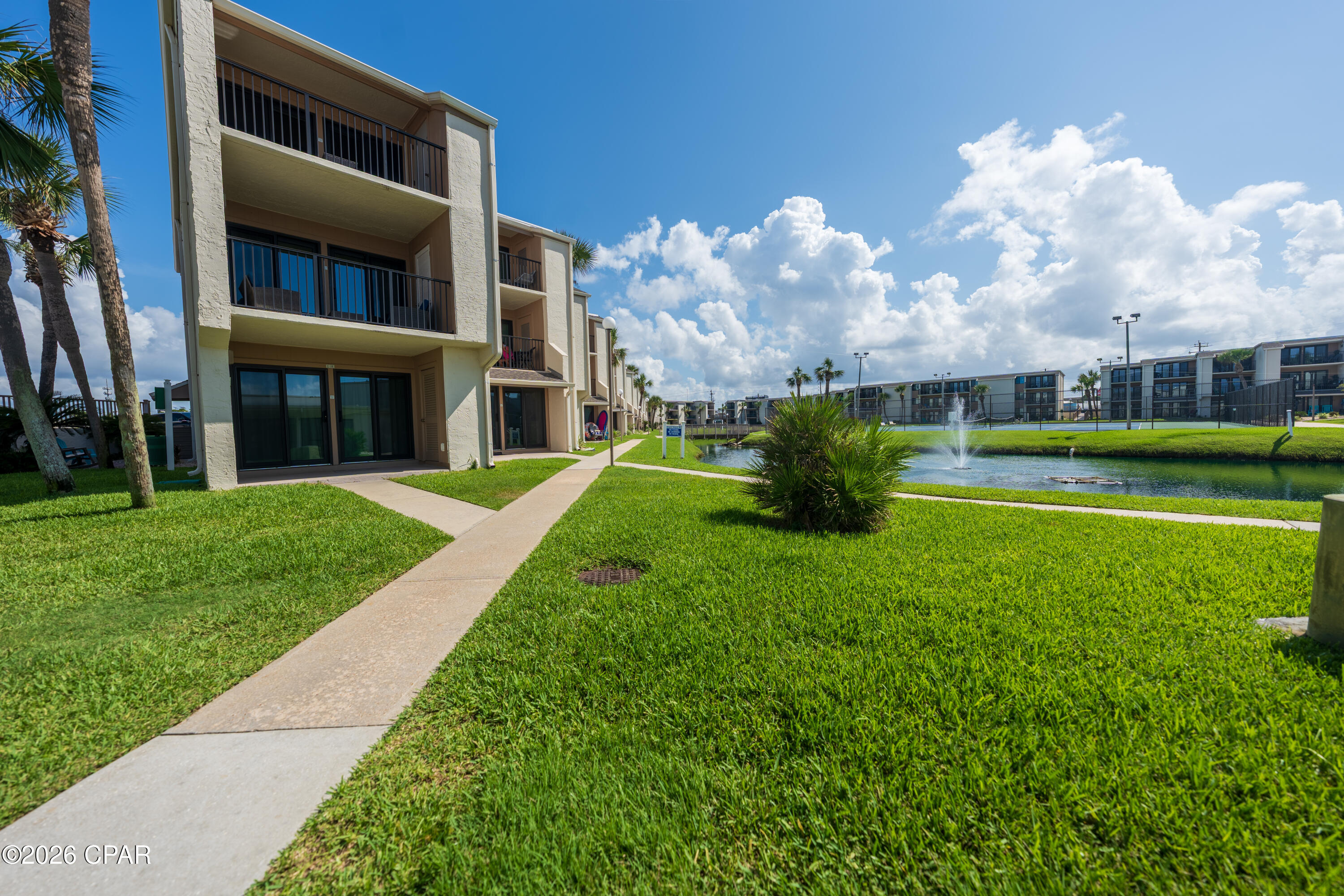 2nd image of 8727 Thomas Dr #D9, Panama City, FL 32408 | MLS# 794191