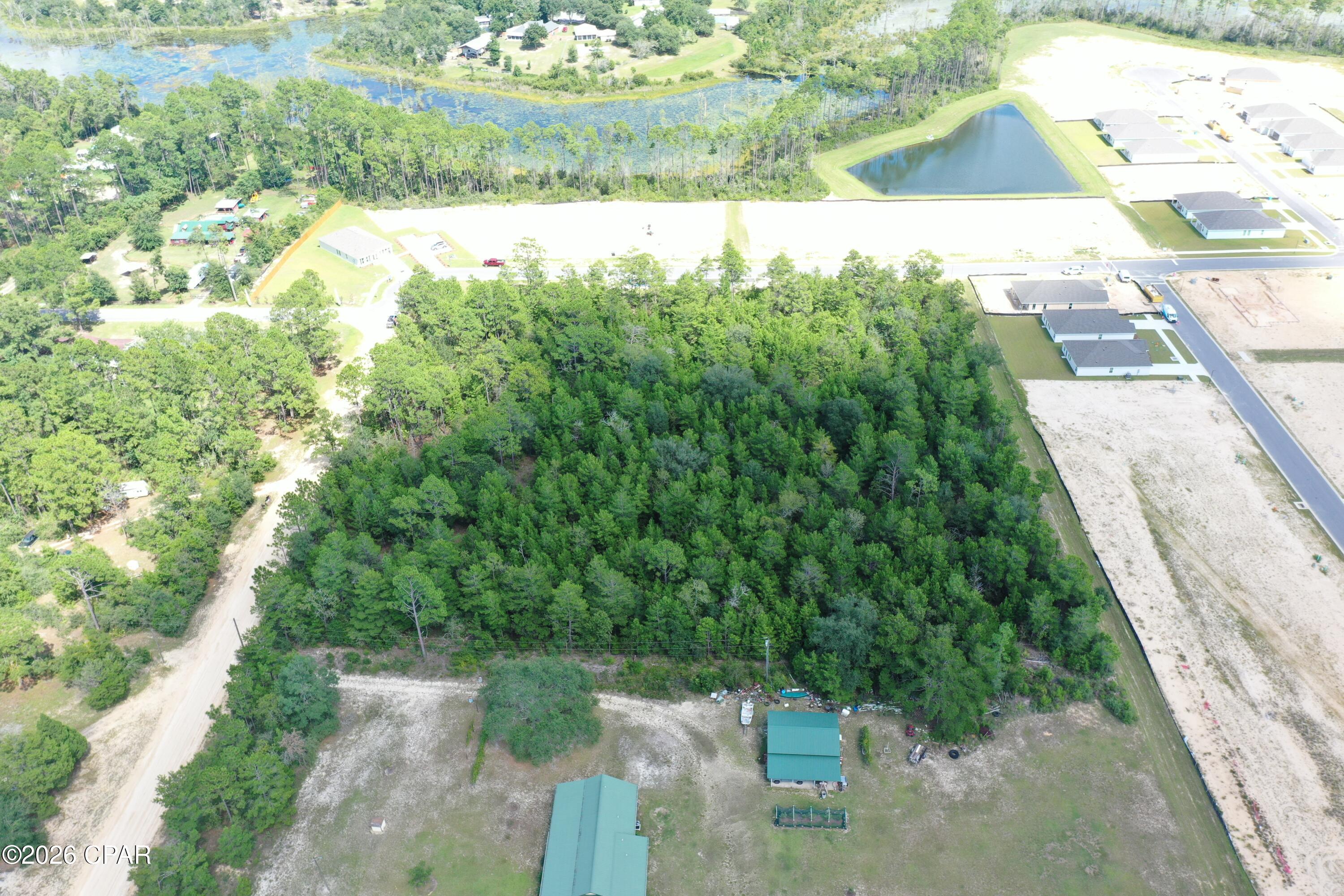 4th image of 0 Dusty Ln, Southport, FL 32409 | MLS# 794526