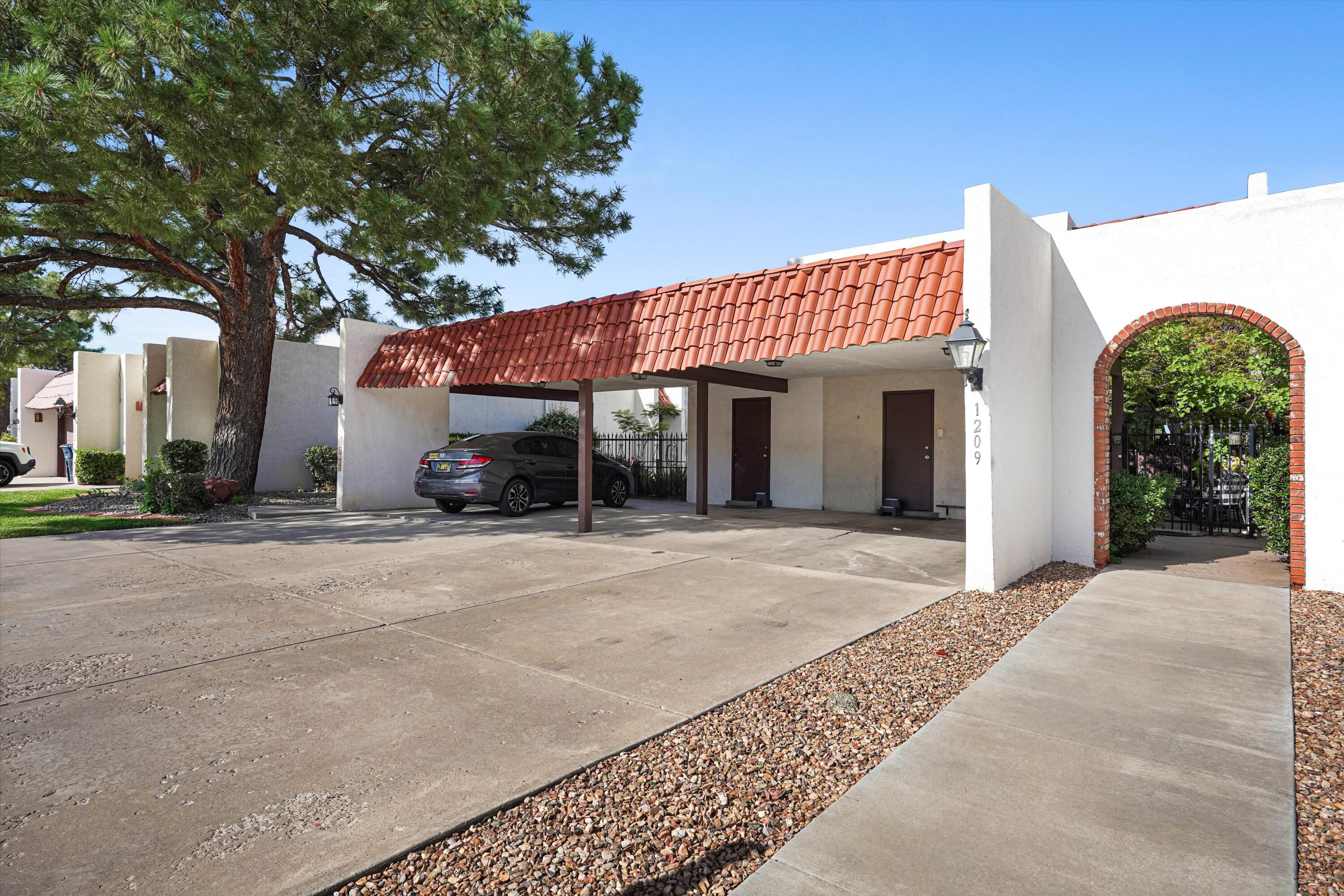Photo 1 of Townhouse for sale at 1209 Bernalillo Pl Se, Albuquerque, NM 87123 | MLS# 1110748 | Listing updated on 2026-09-10