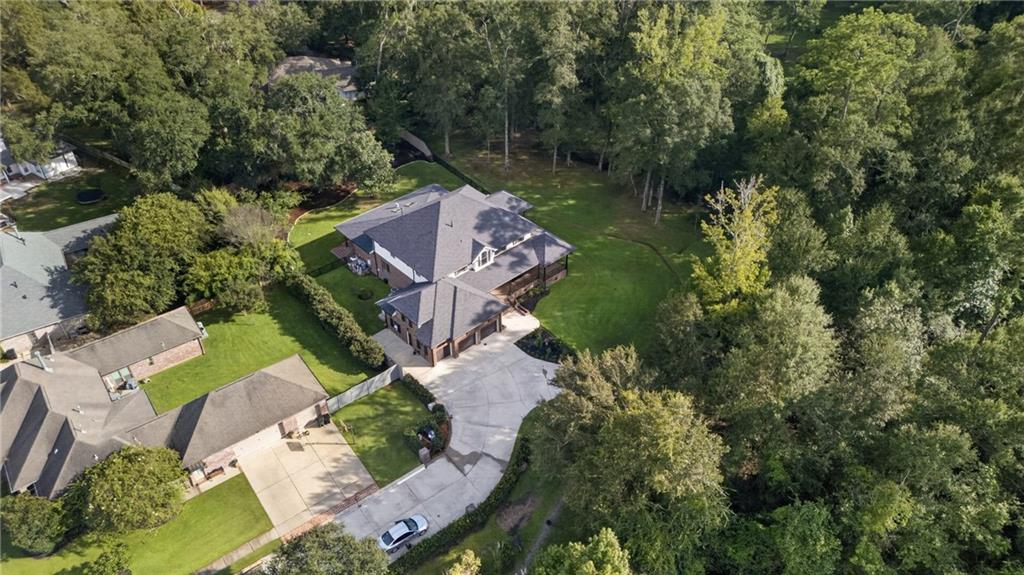 Photo 52 of Single family home for sale at 445 Marina Oaks Dr, Mandeville, LA 70471 | MLS# 2576144 | Listing updated on 2026-09-12