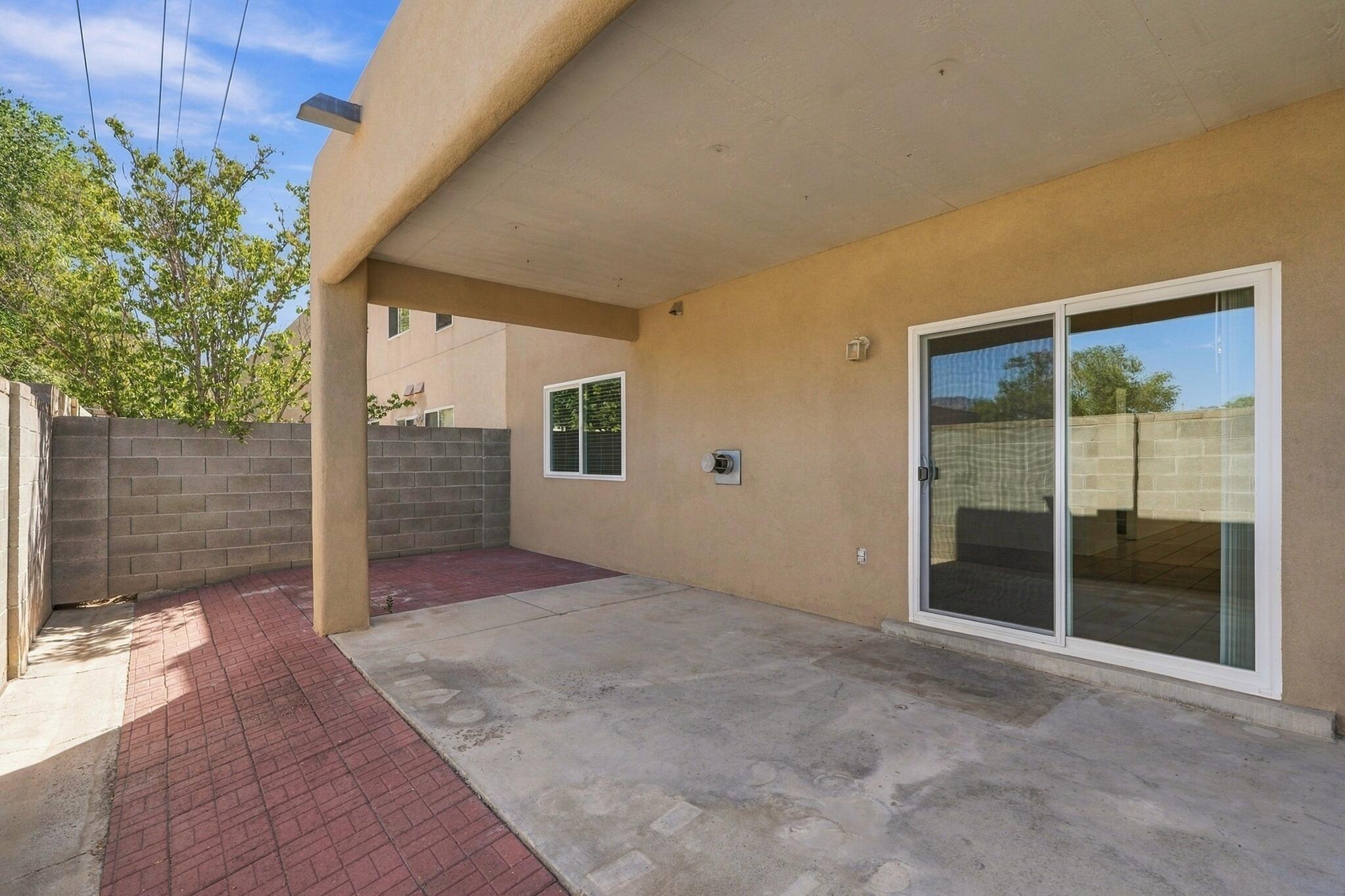 Photo 2 of Townhouse for sale at 11235 Campo Del Oso Ave NE, Albuquerque, NM 87123 | MLS# 1110912 | Listing updated on 2026-09-13