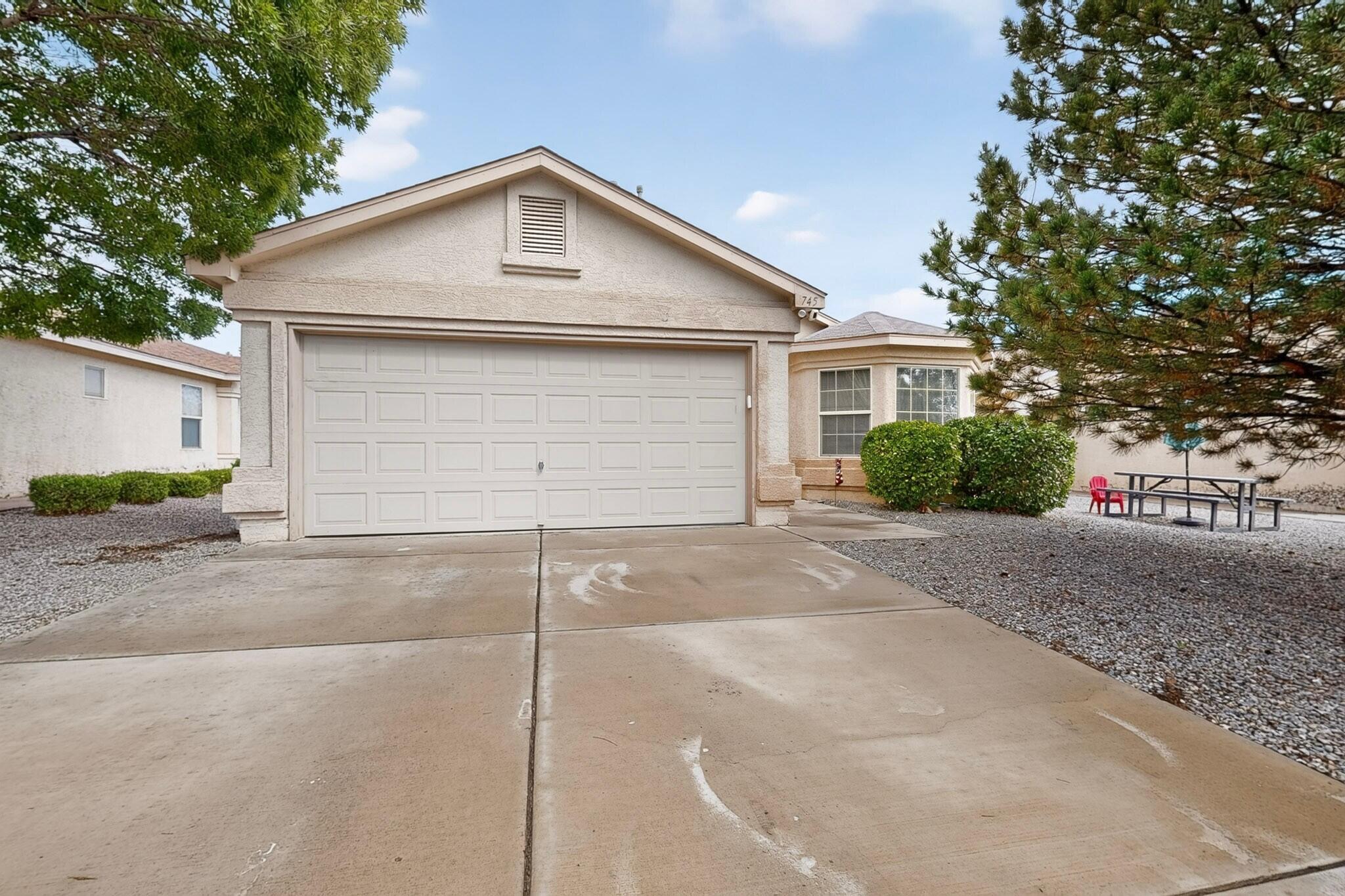 This terrific 3-bedroom 2-bath home offers comfortable single-level living and has been lovingly maintained and in great condition. Featuring a 2-car garage-mostly tile flooring throughout. This home combines easy living with lasting appeal. The beautiful backyard provides a wonderful outdoor retreat-perfect for relaxing and entertaining or enjoying New Mexico's beautiful weather. A NEW ROOF 10/26 providing an added benefit for the next homeowner. This is a truly special home where pride of ownership shines throughout.