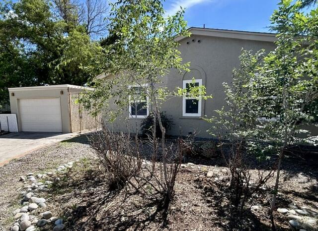 MOVE IN READY home located in a quiet Cul- De-Sac in a desirable area in the north east heights. Newly renovated with FRESH PAINT throughout, new shingles on roof. Detached 1 car garage with separate storage room. Moveable island in the kitchen. Fireplace in the master suite. Large great room with fireplace.Security gate at entrance. Includes washer, dryer and refrigerator.