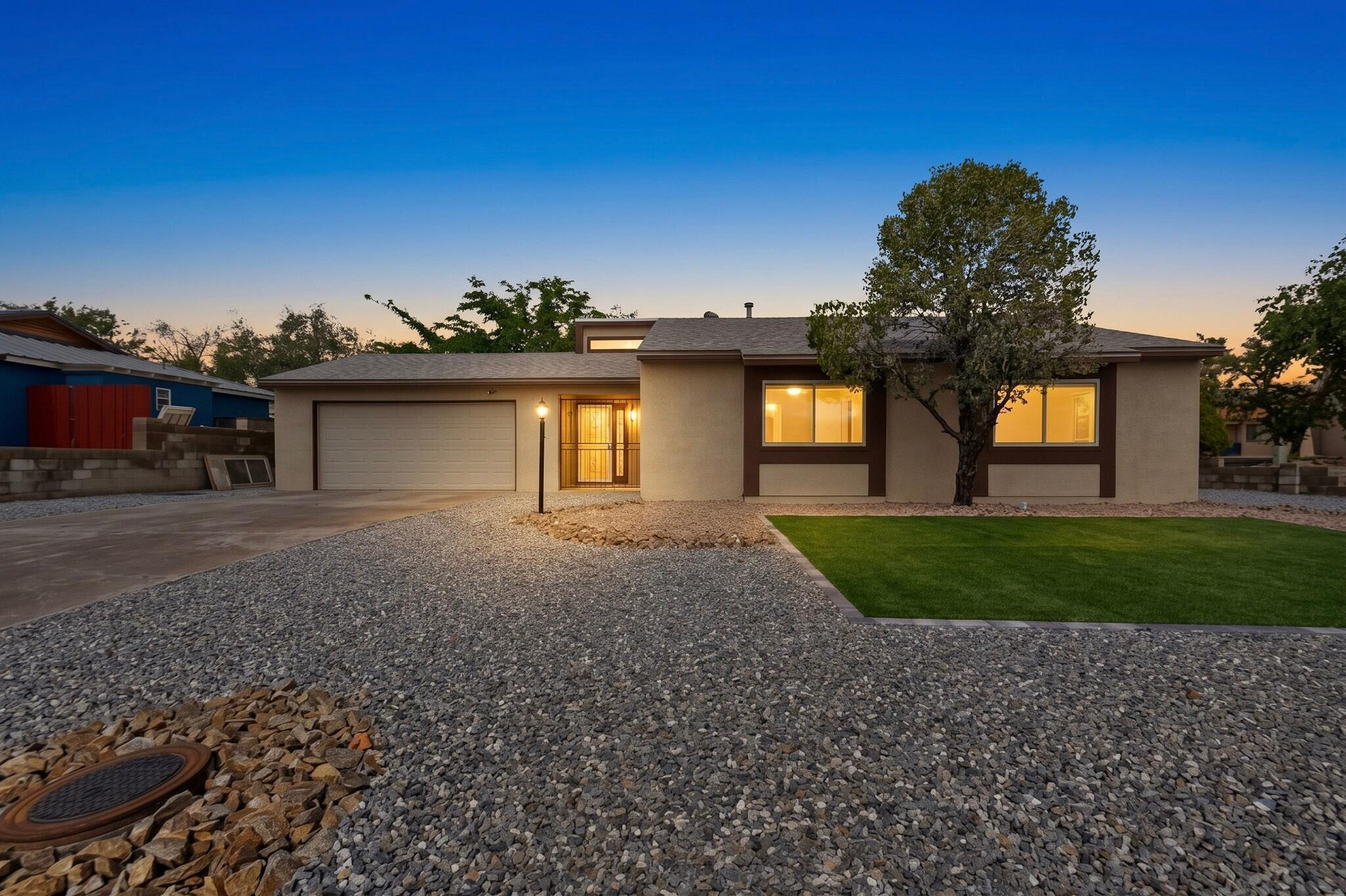 Welcome to this inviting single-story home on a corner lot in Rio Rancho! Featuring 3 bedrooms, 2 bathrooms. This home offers high ceilings and an attached 2-car garage. Recent improvements include replaced carpet, updated exterior paint and stucco, a freshly landscaped front yard, and a roof replaced in May. Enjoy the covered patio and terraced backyard with room to relax or entertain. Conveniently located near a park, this home combines comfortable living with refreshed curb appeal.