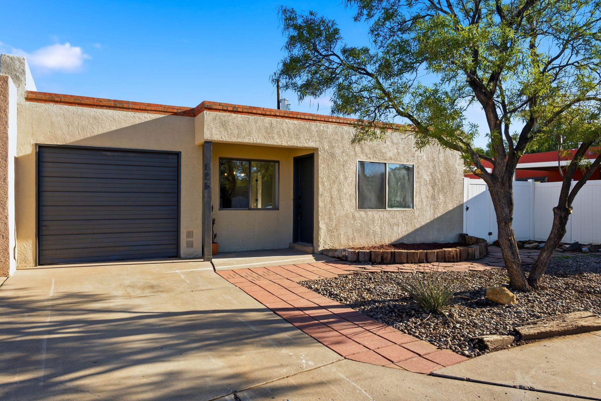 Photo 2 of Townhouse for sale at 325 Shannon Pl NW, Albuquerque, NM 87107 | MLS# 1111996 | Listing updated on 2026-10-05