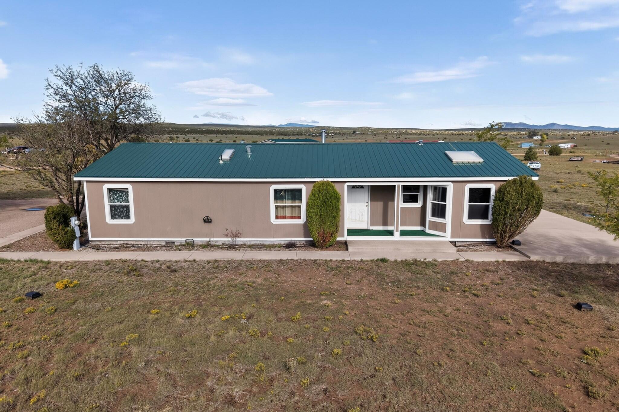 Photo 1 of Manufactured home for sale at 74 Coyote Loop, Moriarty, NM 87035 | MLS# 1112102 | Listing updated on 2026-10-07