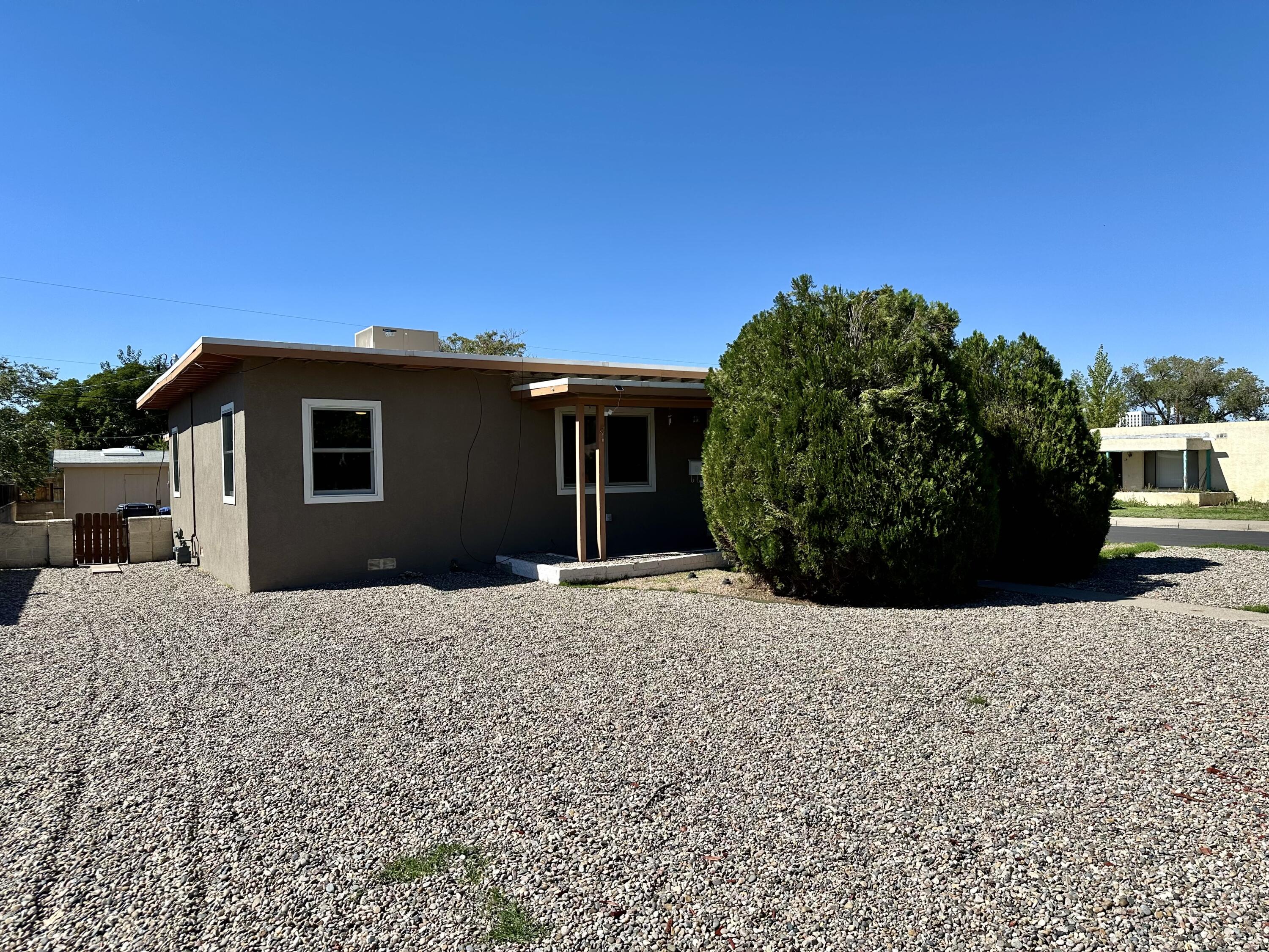 Priced to sell fast. Great opportunity at 701 Cardenas SE! Ideally located and recently remodeled, this property offers a fresh, updated feel with exciting potential. Remodel includes but not limited to over $50,000 in new windows and doors. The split-pad configuration creates a unique opportunity for flexible use and future possibilities. Convenient location with easy access to nearby shopping, dining, services, and major routes. A must-see property with versatility and potential!