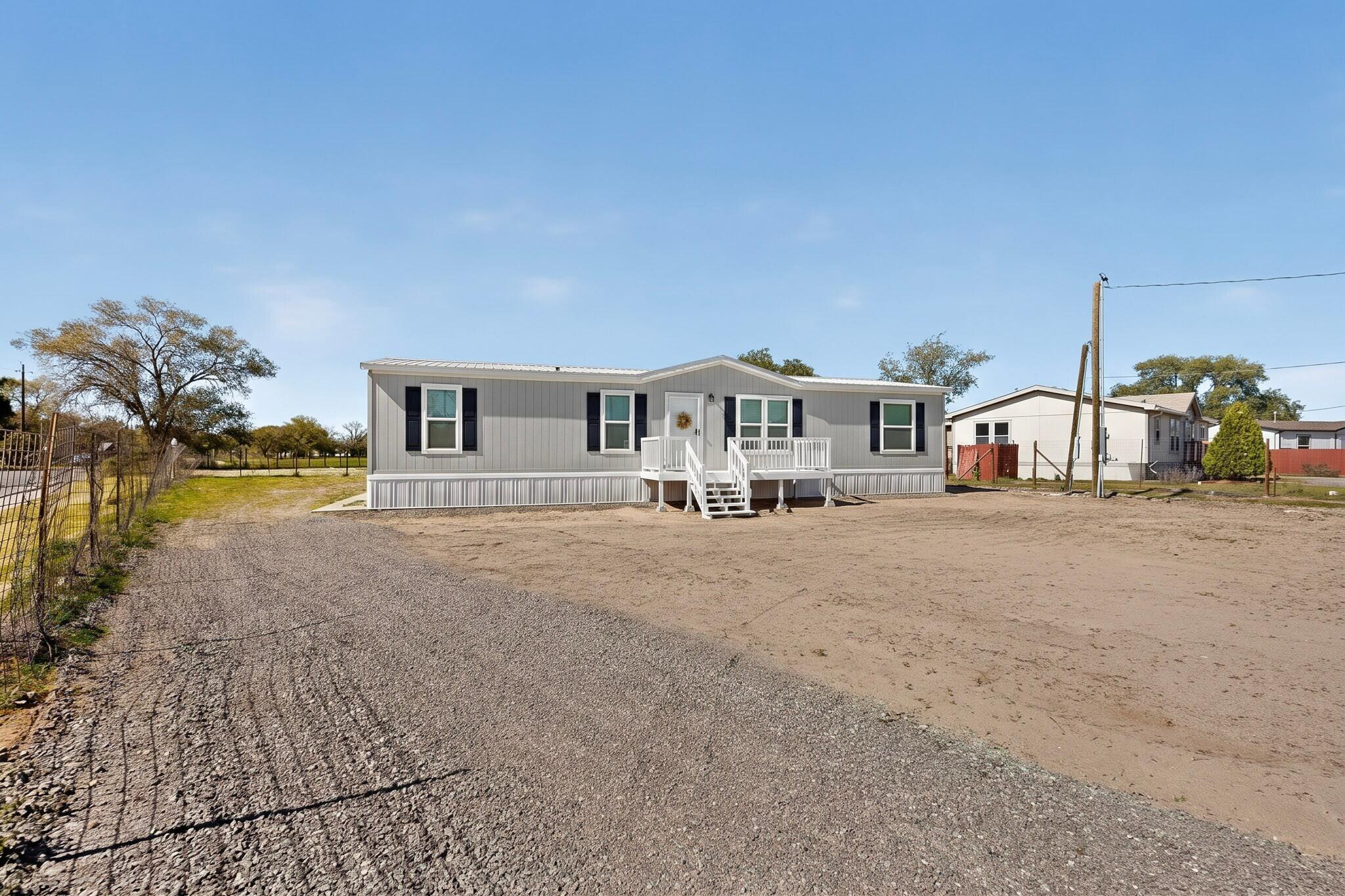 Photo 3 of Sale Pending at 704 Juan P Sanchez Rd Sw, Los Lunas, NM 87031 | MLS# 1112271 | Listing updated on 2026-10-23