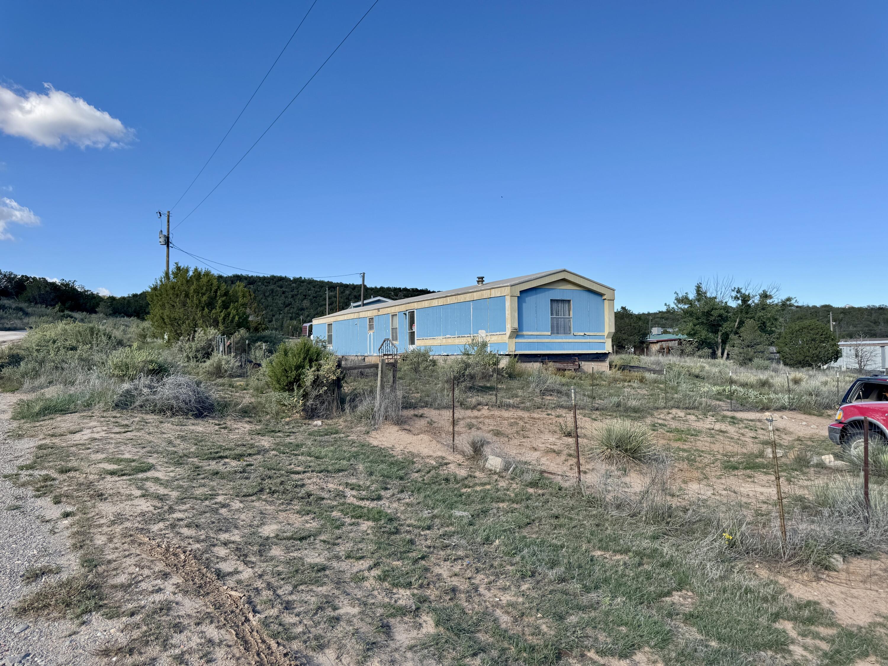 Photo 1 of Manufactured home for sale at 7 Lost Cyn Rd, Edgewood, NM 87015 | MLS# 1112273 | Listing updated on 2026-10-09