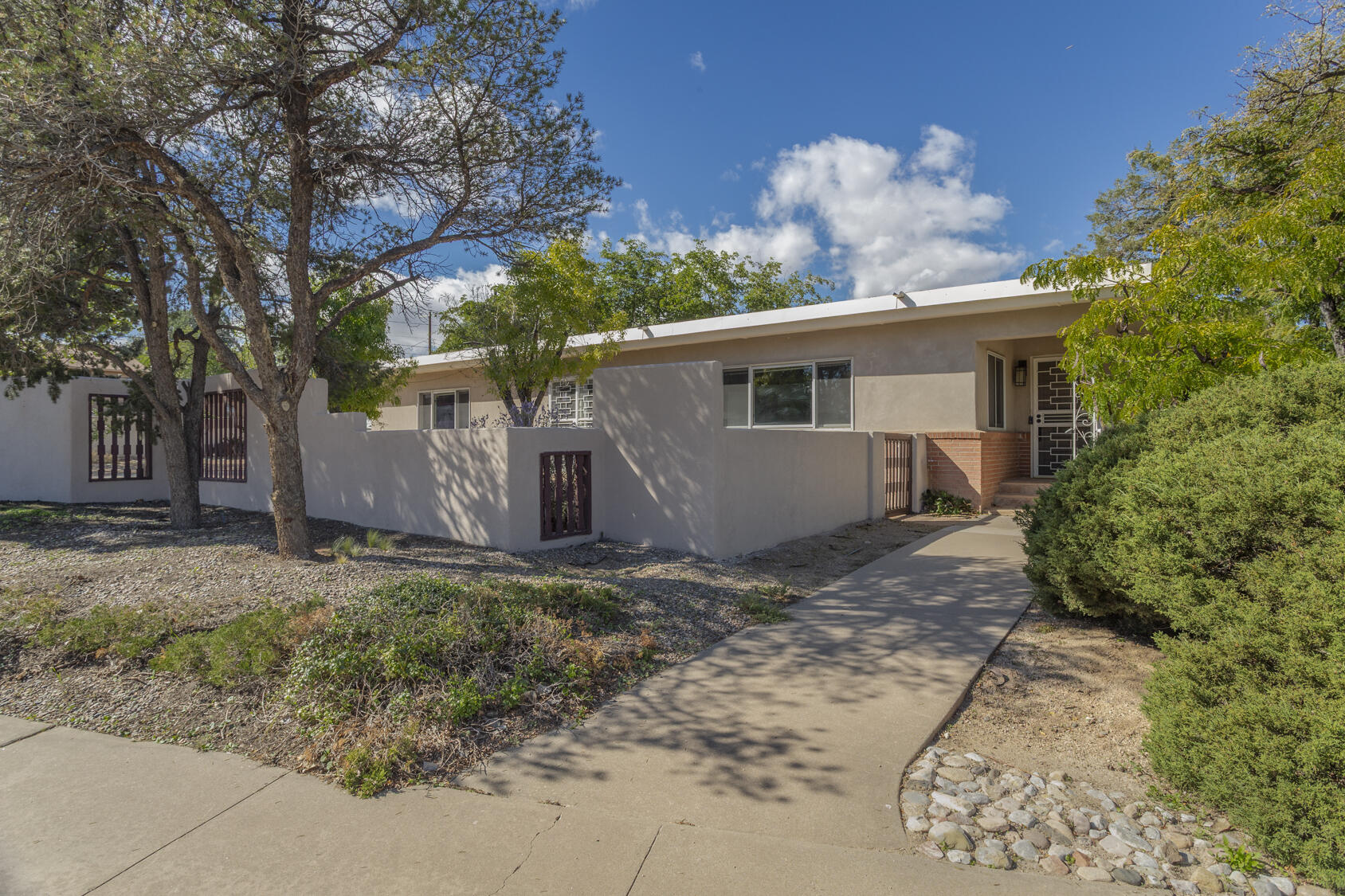 Photo 2 of Single family home for sale at 1621 Stanford Dr Ne, Albuquerque, NM 87106 | MLS# 1112505 | Listing updated on 2026-10-23