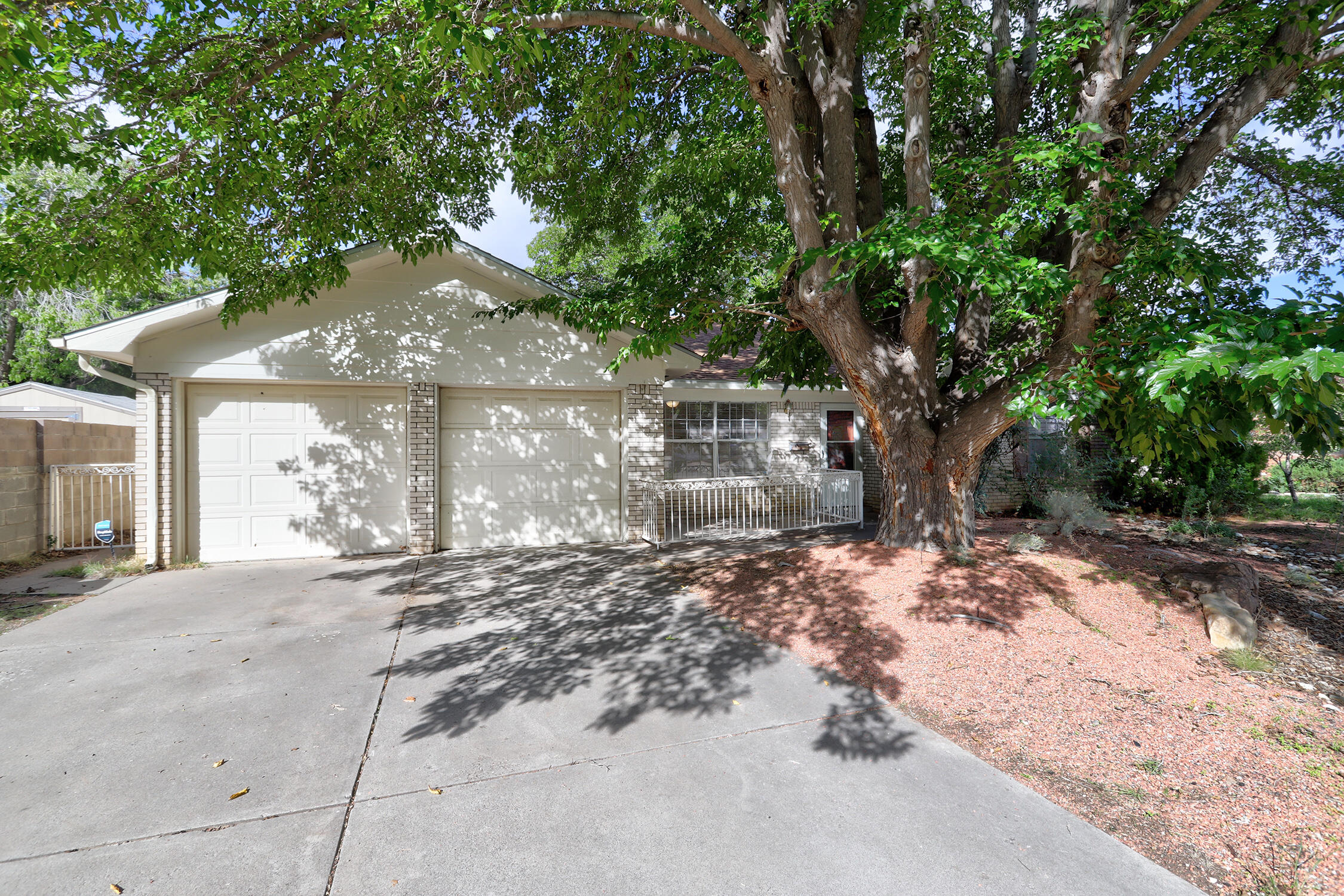 This charming single story home is nestled at the end of a quiet Cul-de-sac with mature trees. Built by Jenkins with 1960's build quality, this was their most popular floor plan featuring it's versatility with 3 Bedrooms, 1.75 Bathrooms, 2 Living Areas, and open concept Kitchen that opens to Living Room / Dining Room with fireplace. Tile & laminate flooring throughout (No carpet). Bathrooms have been updated. Large backyard great for entertaining & green-thumb projects.  Fantastic location with easy access to uptown, shopping, restaurants, and freeway. This house is ready for you to make it your new home.