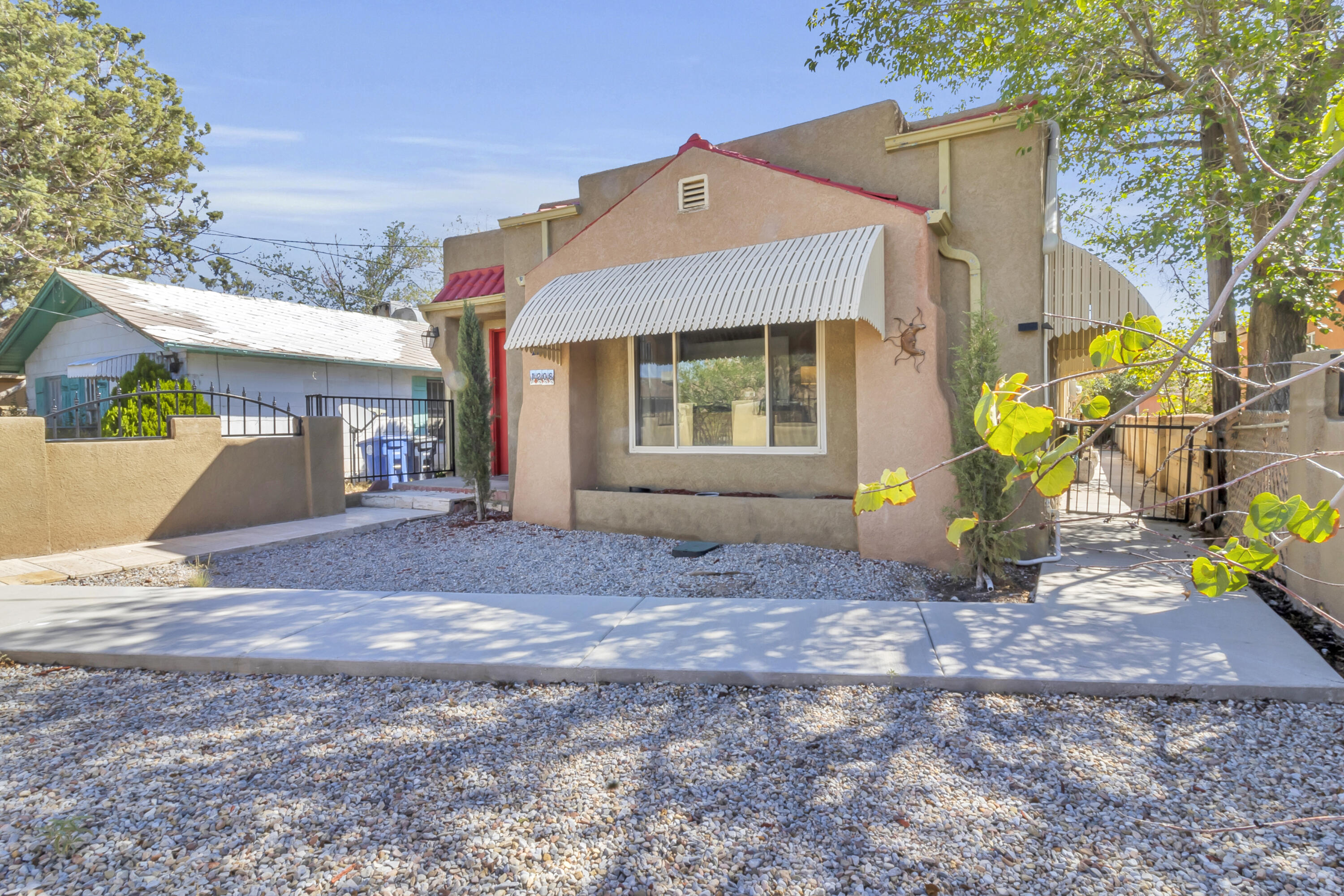 Photo 2 of Single family home for sale at 1208 12th Street Nw, Albuquerque, NM 87104 | MLS# 1112981 | Listing updated on 2026-10-23
