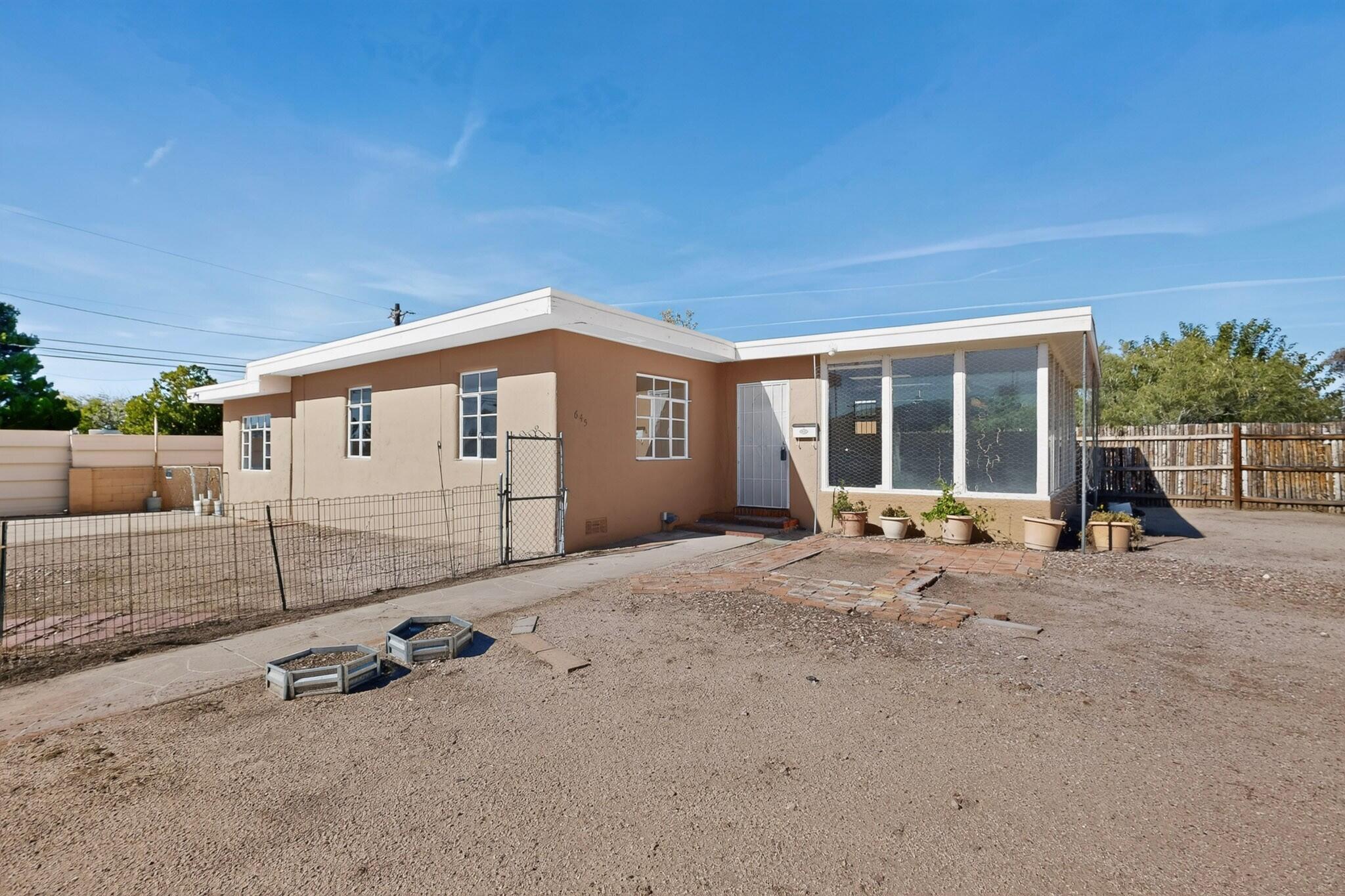 Photo 2 of Single family home for sale at 645 Valencia Dr SE, Albuquerque, NM 87108 | MLS# 1113277 | Listing updated on 2026-10-30