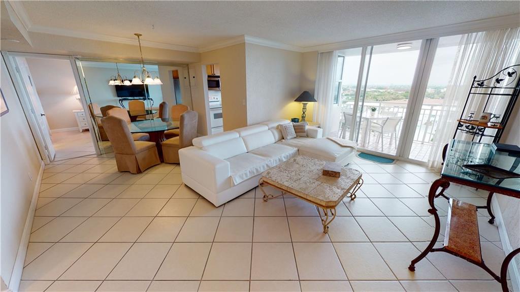 LIVING ROOM FLANKED BY DINING AREA