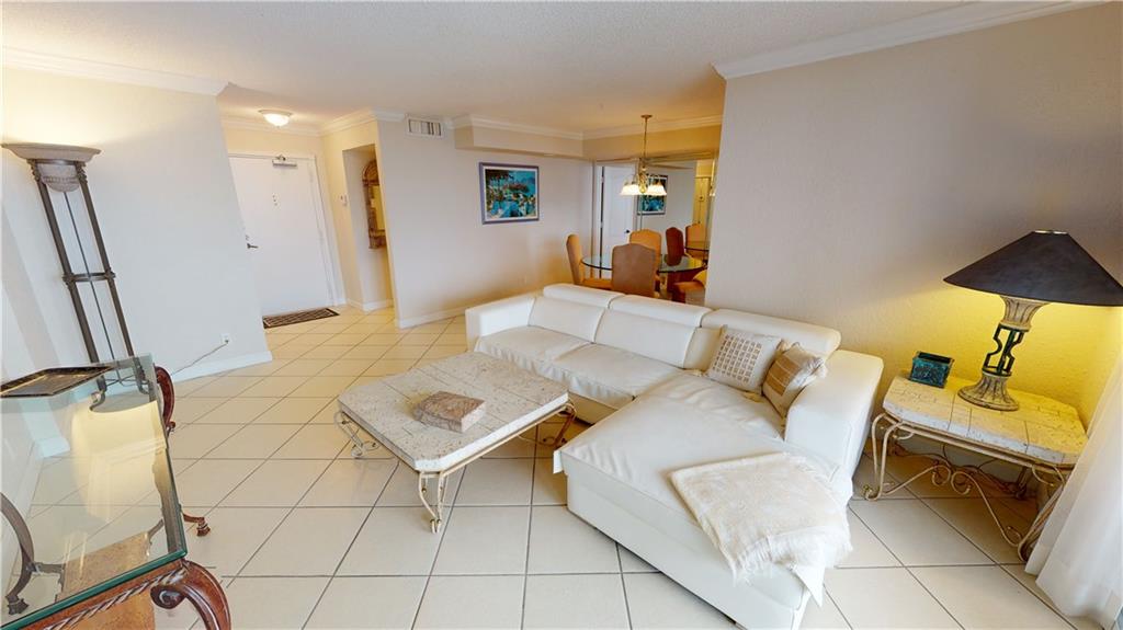 A PEEK AT THE ENTRY WITH A HALF BATH PAST THE VESTIBULE