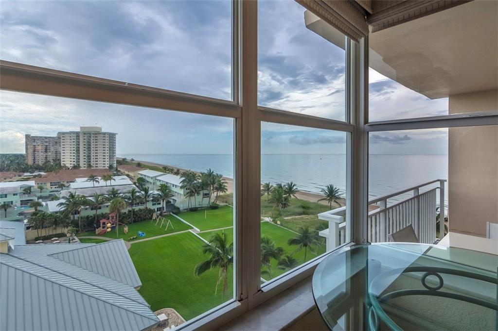 VIEW FROM KITCHEN AND BALCONY OFF LIVING AREA