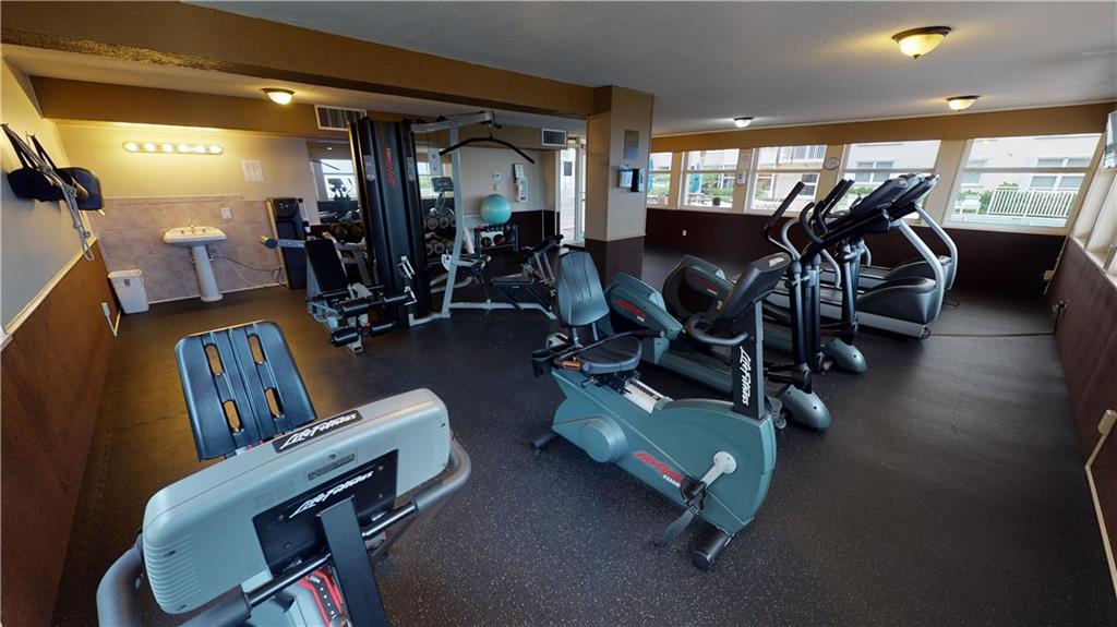 EXERCISE ROOM LOOKING TOWARDS THE POOL