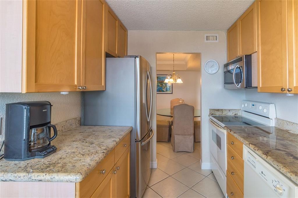 KITCHEN LOOKING TOWARDS DINING ROOM