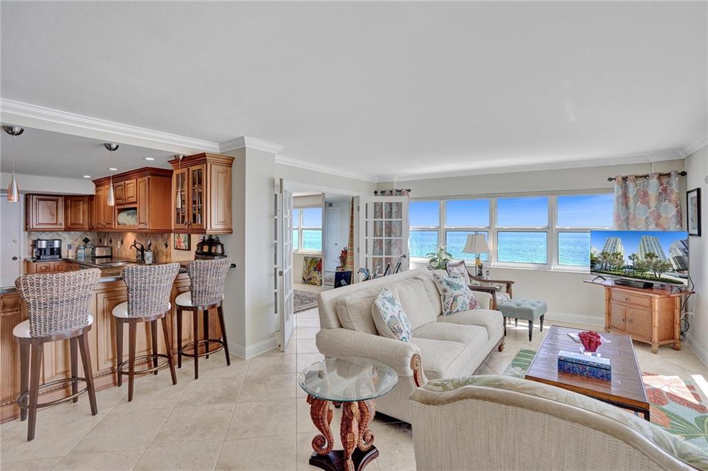 Water views from every room. This is a sunny, light filled corner apartment. The french doors lead into a room that was converted from part of the kitchen which can also be used as a 3rd bedroom. See photos #17 & #18.