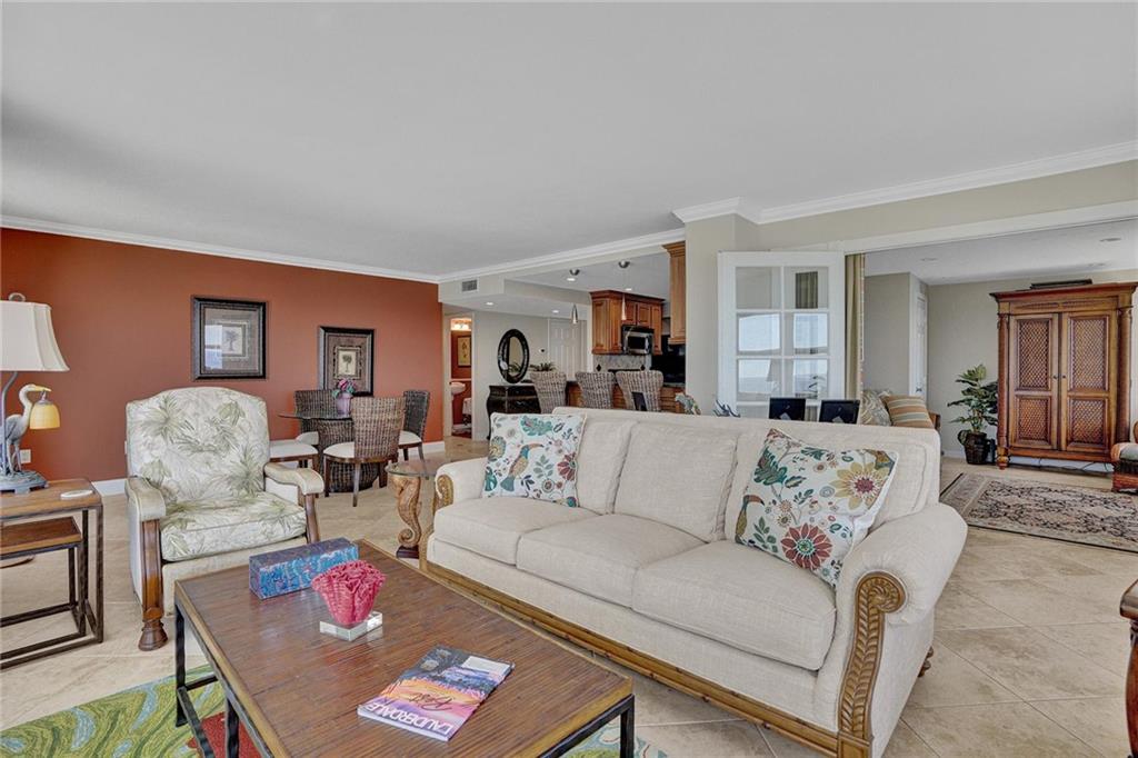 The french doors lead into a room that is being used as a den. This area was originally part of the kitchen. This room is perfect for a 3rd bedroom. This room has a closet, and more beautiful ocean views.