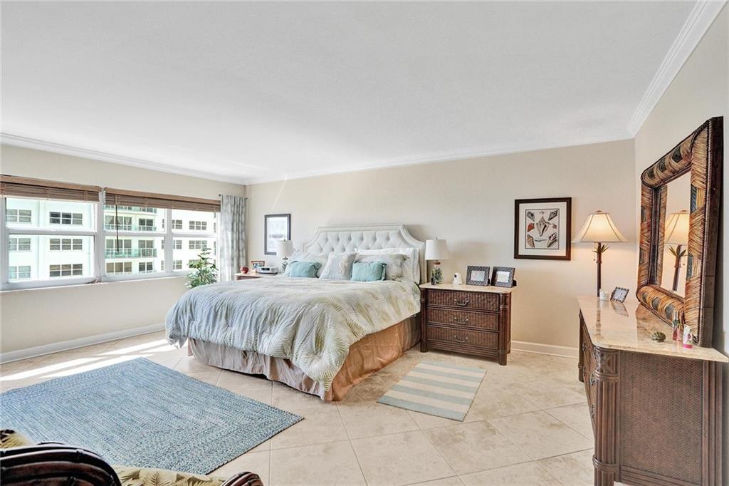 Southpoint is known for its roomy primary bedrooms. This bed is placed perfectly so that you can see the ocean.