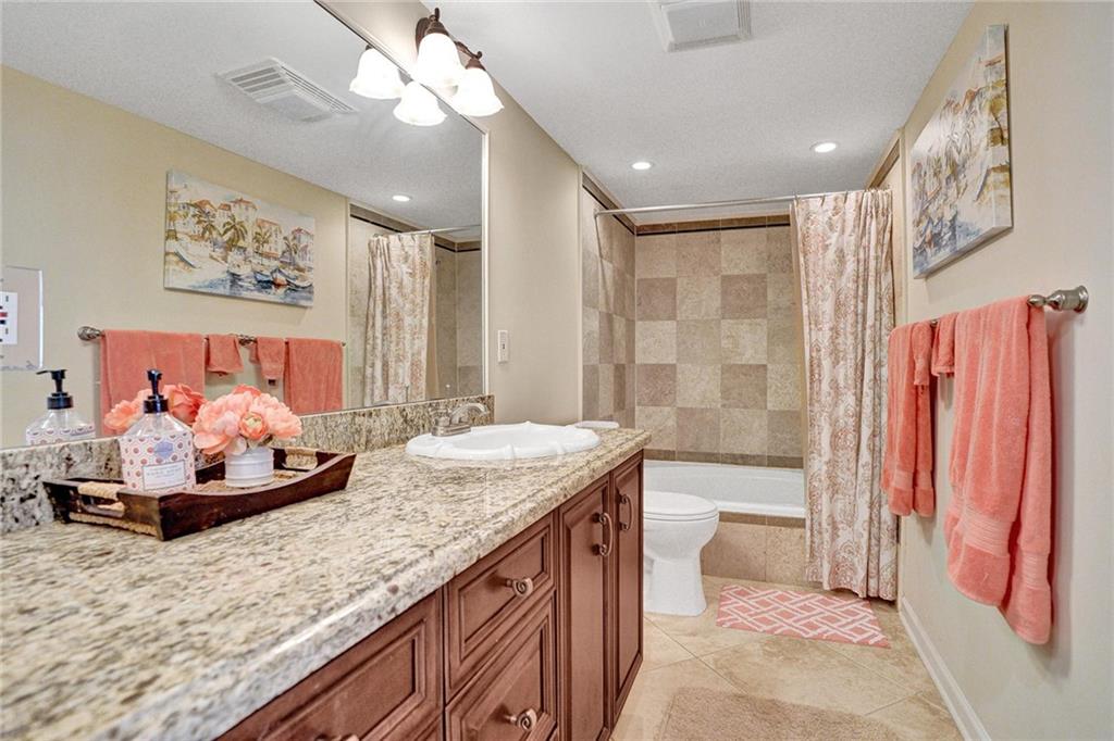 A shower and a large tub is is a great way to relax after a hard day on the beach.