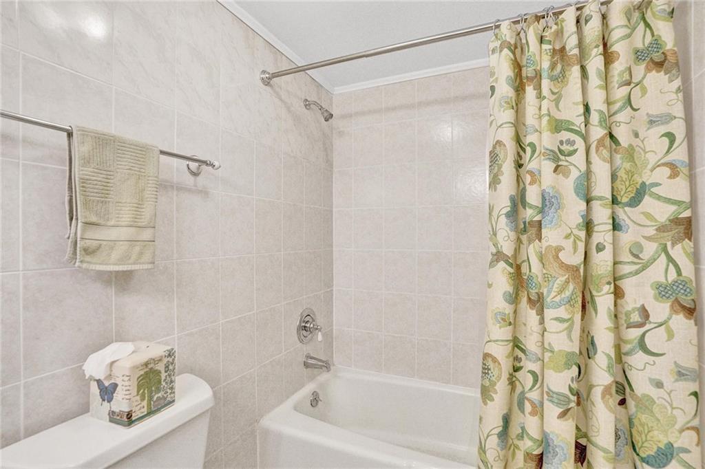 The second bathroom also has a shower and tub.
