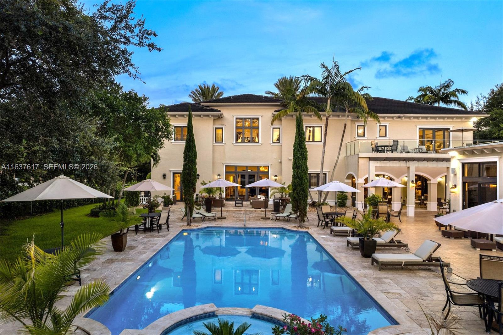 Wake up to the tranquility of tree-lined streets and experience resort-style living in the heart of Pinecrest. Set on a sprawling 36,590 SF lot, this stunning 8,321 SF estate offers 7 BD, 6 BA, and 2 HB designed for effortless luxury. A soaring triple-height foyer opens to elegant spaces for every occasion, including wine cellars, wet bar, movie theatre, and game room. The chef’s kitchen features premium appliances, an oversized island, and pantry. Outdoors, enjoy sun-filled days by the saltwater pool and jacuzzi, al fresco dining from the summer kitchen, and recreation on the sport court. A cabana with bar and rec room enhances the retreat, while an elevator, generator, Savant system, impact windows/doors, and AC 3-car garage complete the home. Some photos virtually staged.