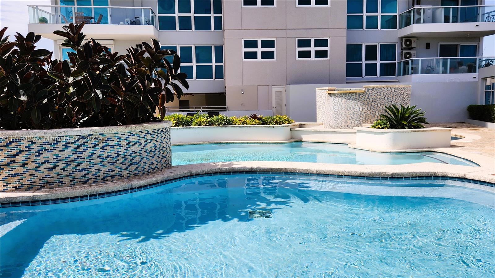 Well-appointed guest bedroom at 52 Luis Muñoz Rivera Ave. - Condo in San Juan