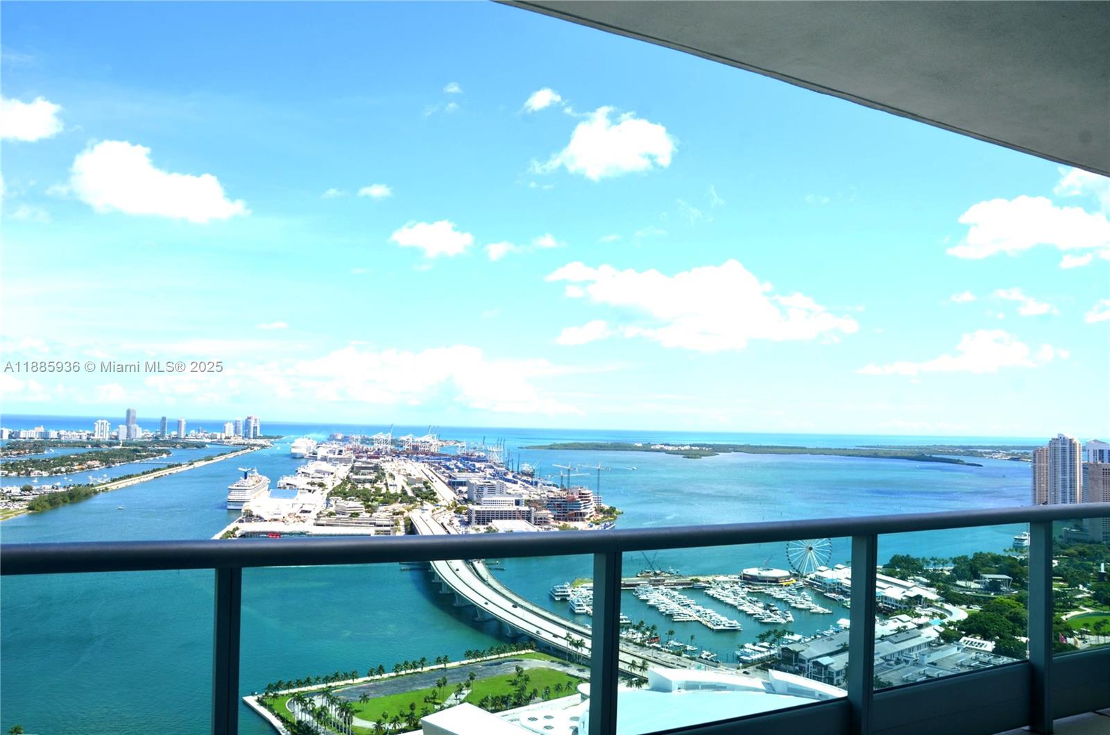 Discover the ultimate in opulent living within this stunning condo situated on the 51st floor of 900 Biscayne Bay. Revel in mesmerizing views of the ocean, bay, and cityscape from every room. This residence features elegant,newly installed flooring, lofty ceilings, and expansive windows that beam natural light. The open-plan living space and contemporary kitchen, fitted with top-tier appliances, are ideal for hosting gatherings. The main suite has a generous walk-in closet and a lavish en-suite bathroom. A sliding glass door in the den offers versatility, allowing for a seamless transformation into a second bedroom or home office. Amenities encompass a full-service spa, a cutting-edge fitness center,steam room,hot tub, two resort-style swimming pools,a business center,& a billiards lounge.