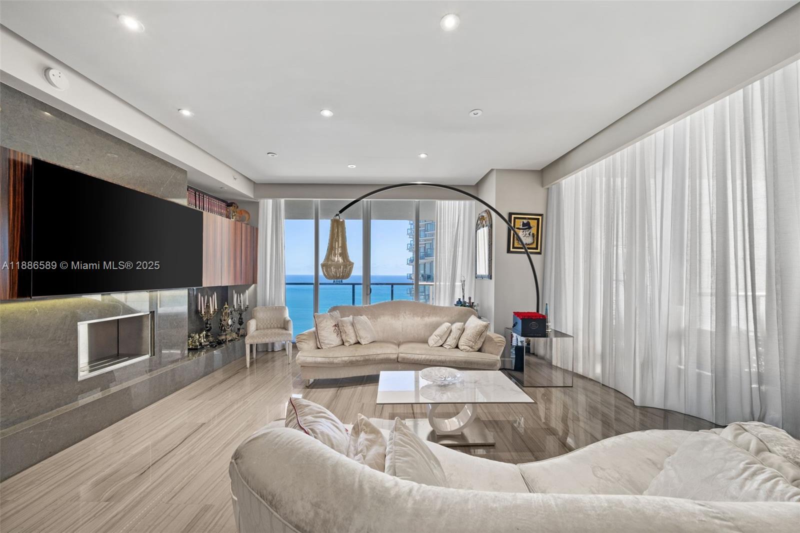 Welcome to Residence 2304N at the St. Regis Bal Harbour, a rarely available flow-through home offering the ultimate oceanfront lifestyle. This 2-bedroom, 2.5-bath residence showcases direct Atlantic views to the east, with floor-to-ceiling glass doors opening to expansive terraces for seamless indoor-outdoor living. Enjoy world class amenities including private beach service, Remède Spa, fine dining, concierge, and 24-hour butler service. Perfectly located across from the renowned Bal Harbour Shops, it offers unmatched sophistication and convenience.