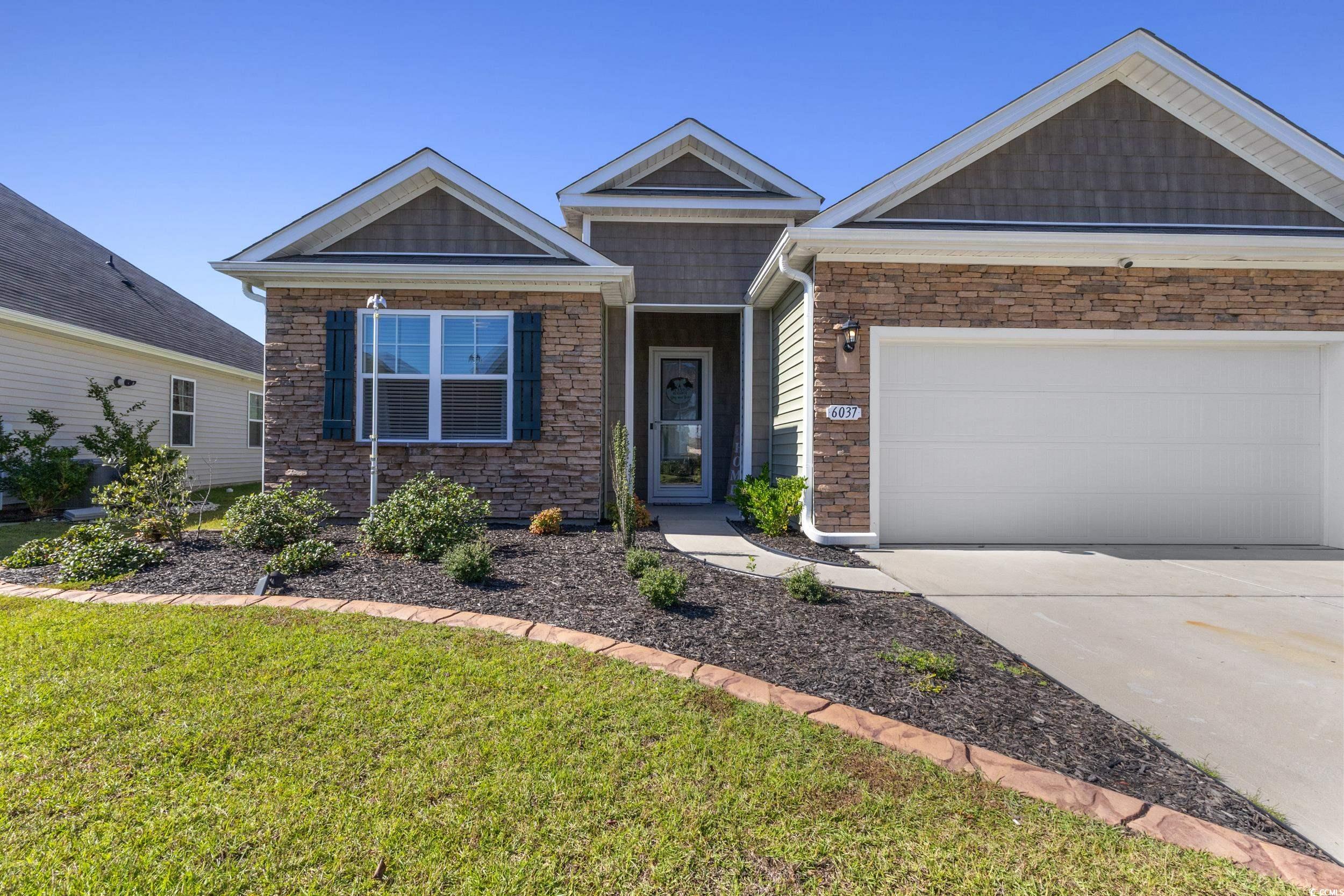 Absolute Stunner ! This popular Eaton floor plan is now available in one of the area’s most sought-after natural gas communities, offering the perfect blend of luxury, comfort, and coastal lifestyle. Enjoy resort-style amenities including a spacious clubhouse with sprawling verandas, an impressive swimming pool, fully conditioned fitness center, fenced dog park, playground, and even a community blueberry garden! Step inside this single-level home and fall in love with its open-concept design, perfect for everyday living and entertaining. The show-stopper kitchen features 36" staggered cabinetry, gorgeous granite countertops, stainless Whirlpool appliances (including a gas range), and a large island that invites everyone to gather. Throughout the main living areas and all bedrooms, you’ll find beautiful wide-plank laminate wood flooring complemented by 10’ ceilings that enhance the sense of space and light. The luxury owner’s suite offers a peaceful retreat with a tray ceiling, dual vanities, a spacious 5’ shower, and not one—but two linen closets. Bathrooms and the laundry room feature elegant tile flooring, and the rear covered porch provides the perfect place to relax and enjoy the Carolina breeze. Schedule a tour today!