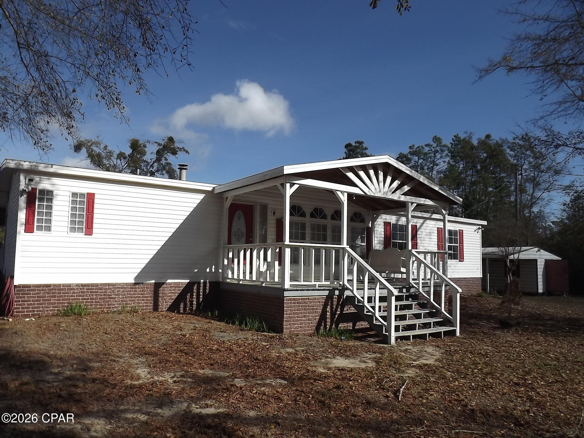 Photo 2 of Manufactured home for sale at 12141 Harrington Rd, Fountain, FL 32438 | MLS# 780703 | Listing updated on 2026-09-17